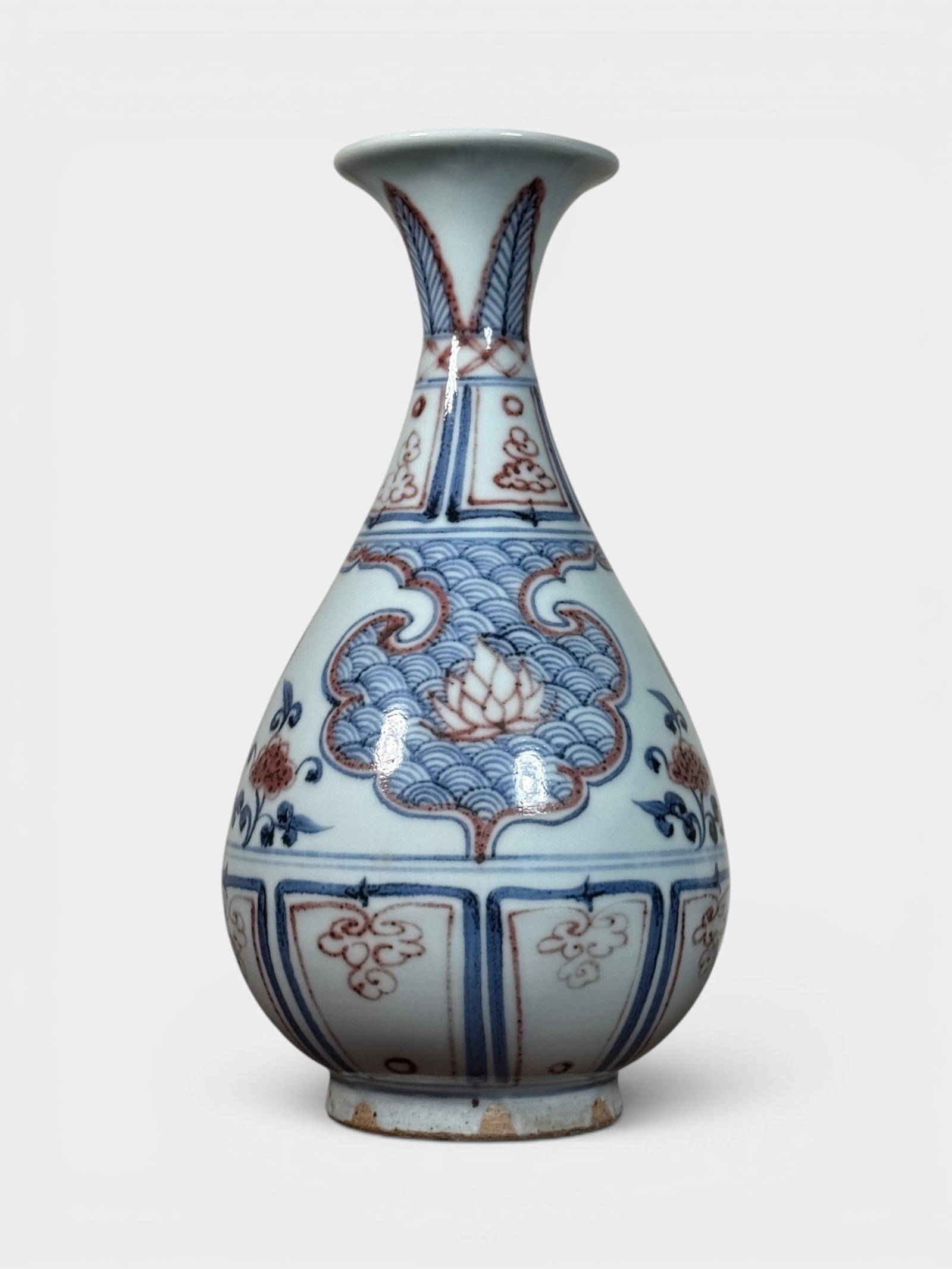 Chinese Porcelain Vase with Copper Red Lotus Design: Chinese porcelain vase with copper red lotus design, 11"ht Shipping: We offer in-house shipping services for most small items. This means that we will take care of packing and shipping the items direc