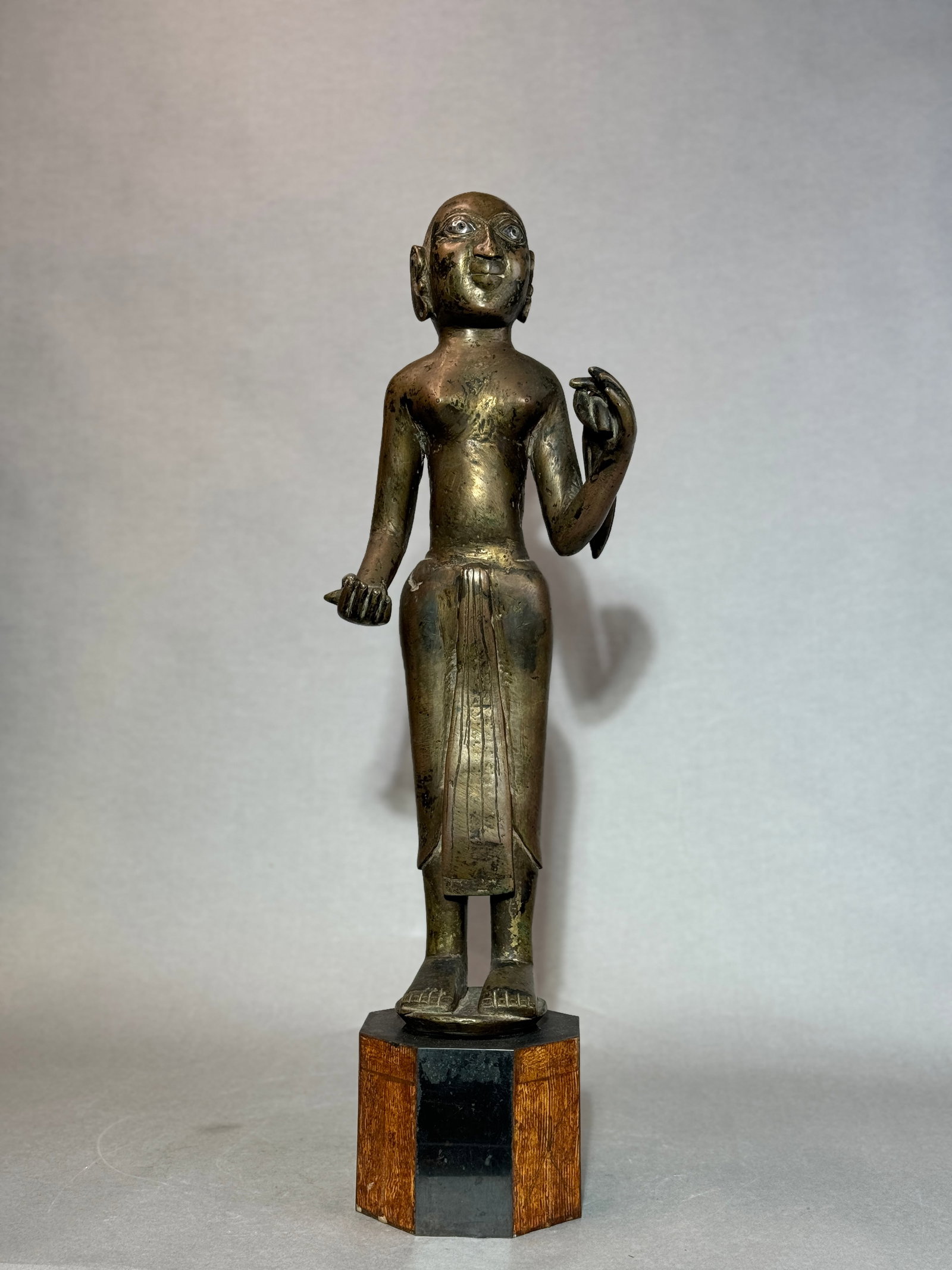 Antique Indian Bronze Figurine with Silver Inlay Eye,18/19th Century: 18/19th cen, 19.25"ht for the bronze figurine, 23.5" when on base, silver inlay eye, very heavy , solid bronze Shipping: We offer in-house shipping services for most small items. This means that we wi