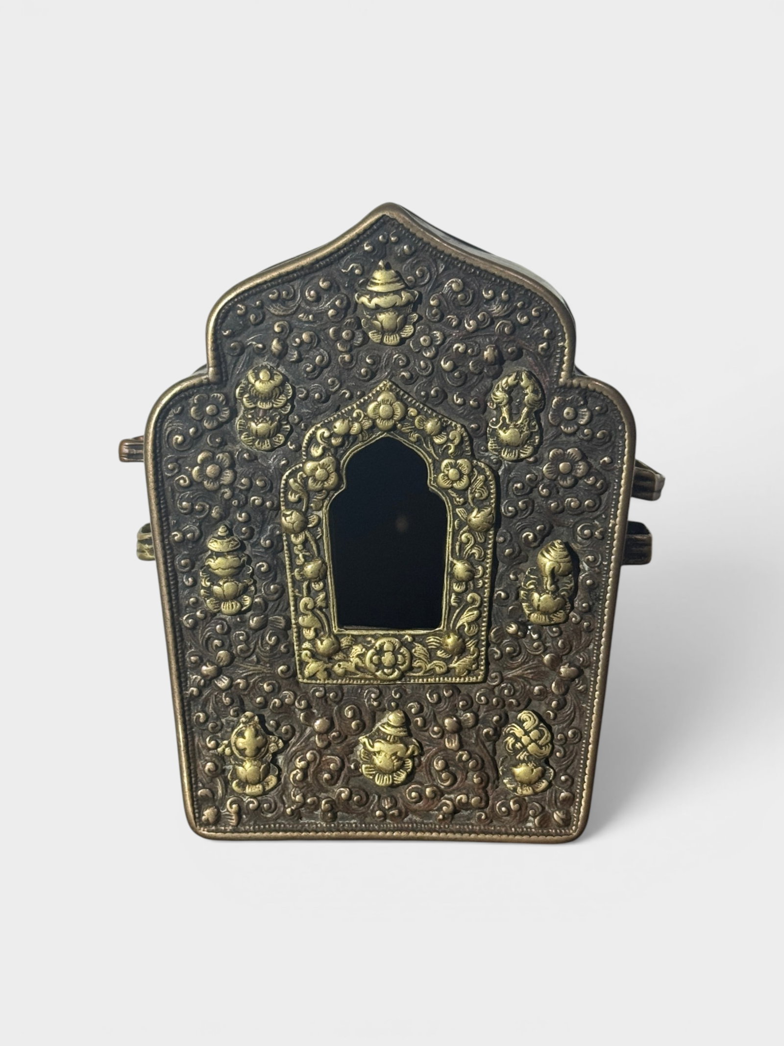 Tibetan Copper Repousse Traveling Shrine: Tibetan copper repousse traveling shrine with detailed chase work, 5"ht Shipping: We offer in-house shipping services for most small items. This means that we will take care of packing and shipping th