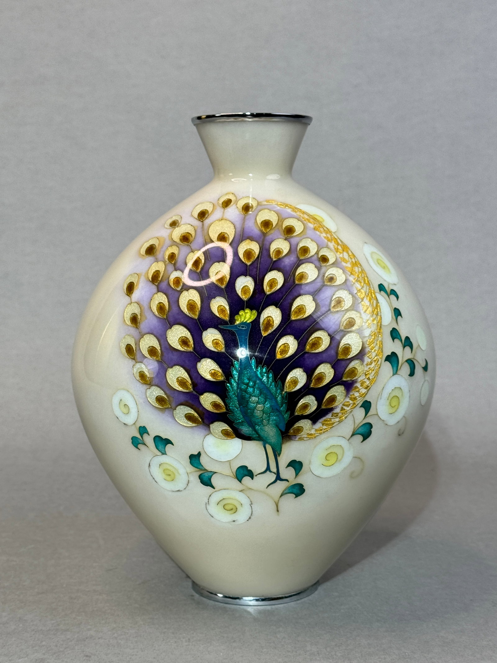 Japanese Cloisonne Vase with Peacock: Japanese cloisonne vase with peacock design, 9"ht Shipping: We offer in-house shipping services for most small items. This means that we will take care of packing and shipping the items directly to yo