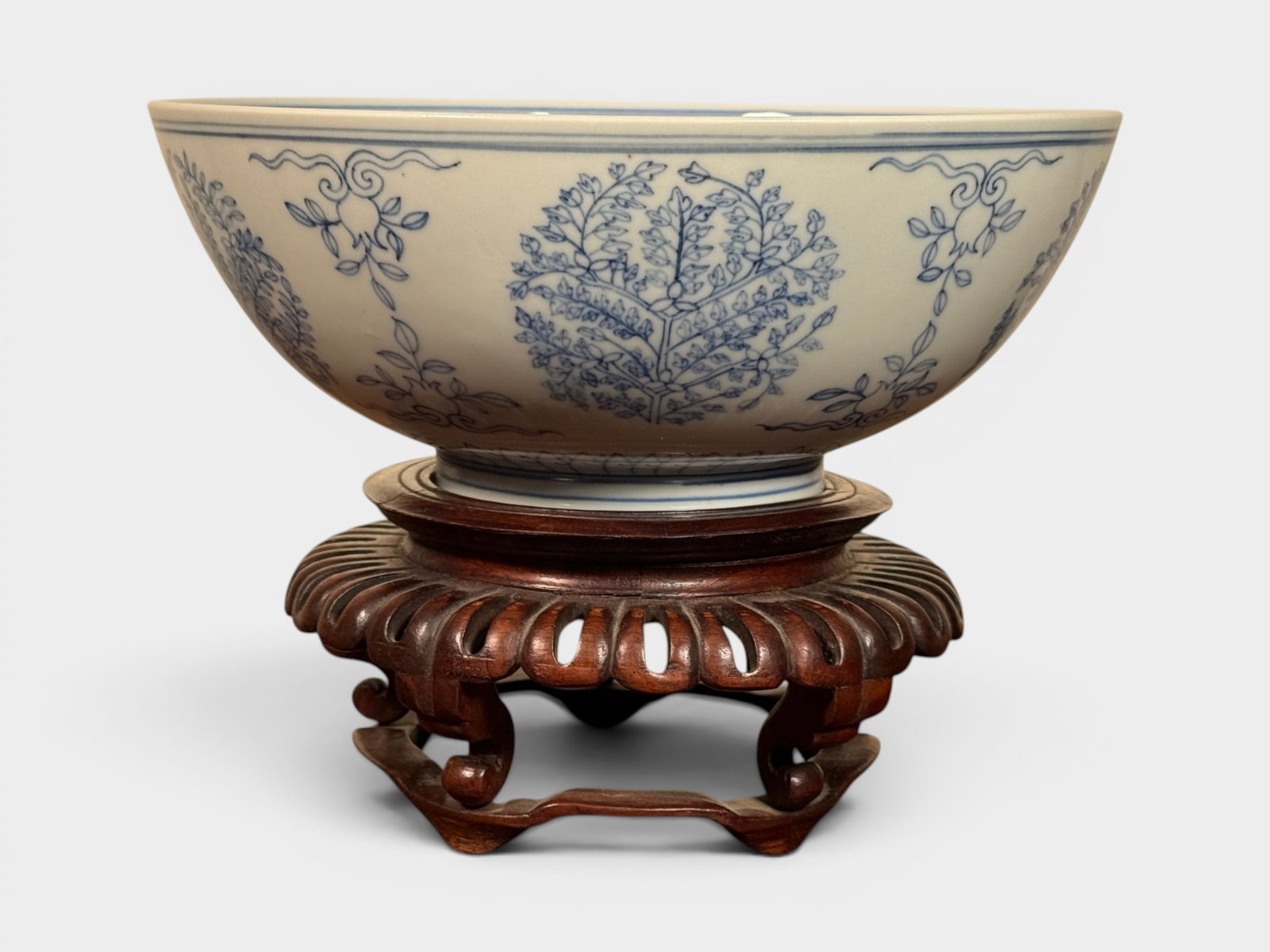 Chinese Blue White Porcelain Bowl on Fancy Wood Stand: Chinese blue white porcelain bowl on fancy carvied wood stand, bowl 5.75"dia Shipping: We offer in-house shipping services for most small items. This means that we will take care of packing and shippi