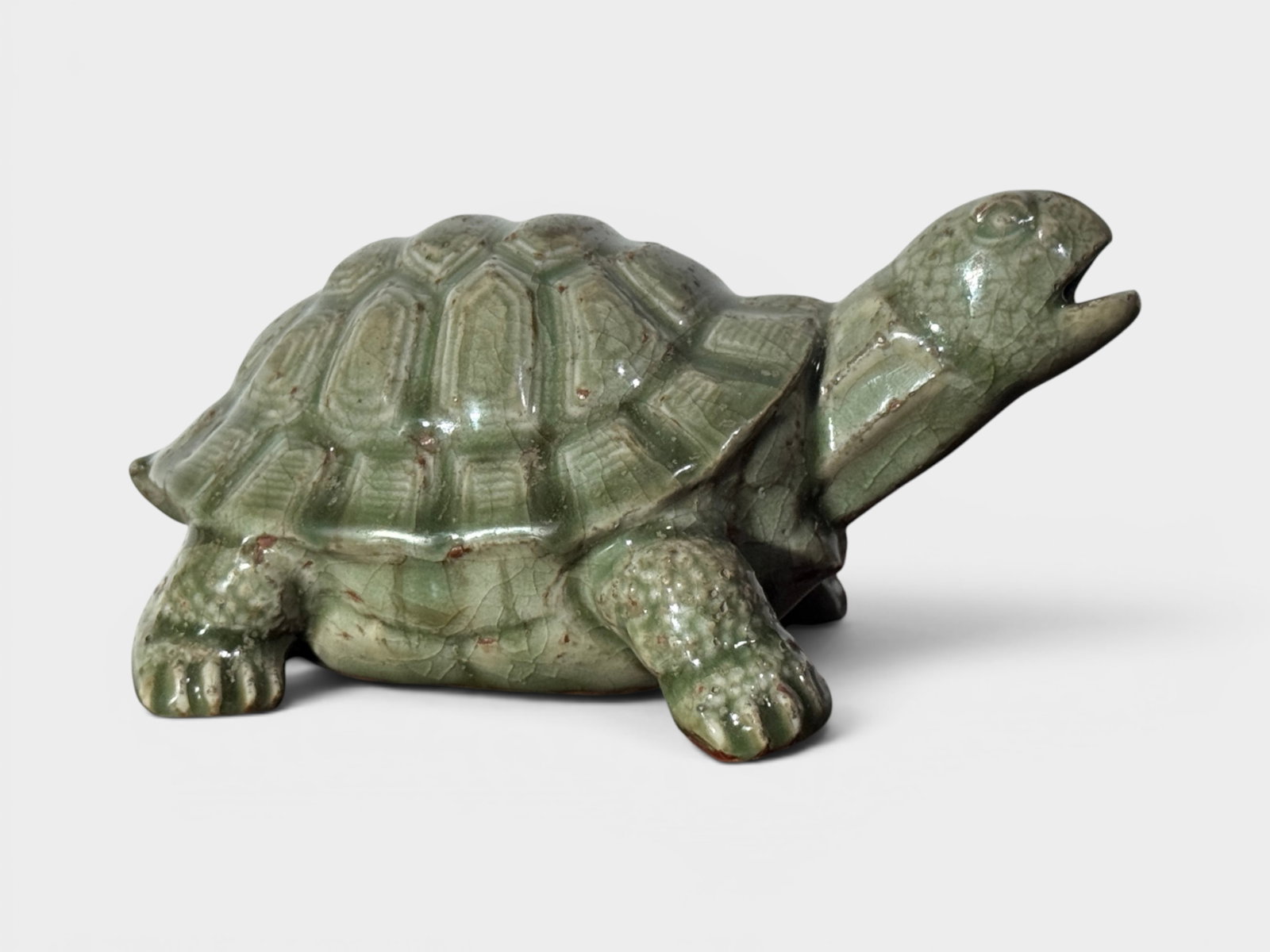 Chinese Celadon Porcelain Model of A Turtle: Chinese celadon porcelain model of a turtle, 7"L Shipping: We offer in-house shipping services for most small items. This means that we will take care of packing and shipping the items directly to you