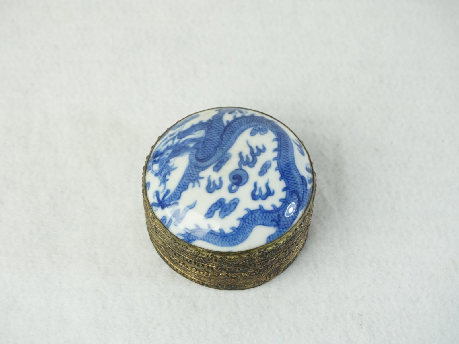 Chinese Metal Trinket Box with Blue And White Porcelain Top: Approximate size: 2.75x2.75x1.75 in Shipping: We offer in-house shipping services for most small items. This means that we will take care of packing and shipping the items directly to you. For larger 
