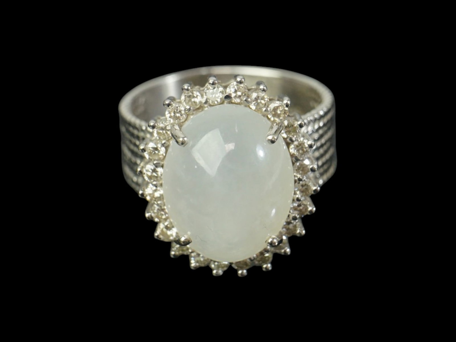 Chinese 14K White Gold And Jadeite Ring: Approximate size: Ring Size 6,overall weight 45.8 ct Shipping: We offer in-house shipping services for most small items. This means that we will take care of packing and shipping the items directly to