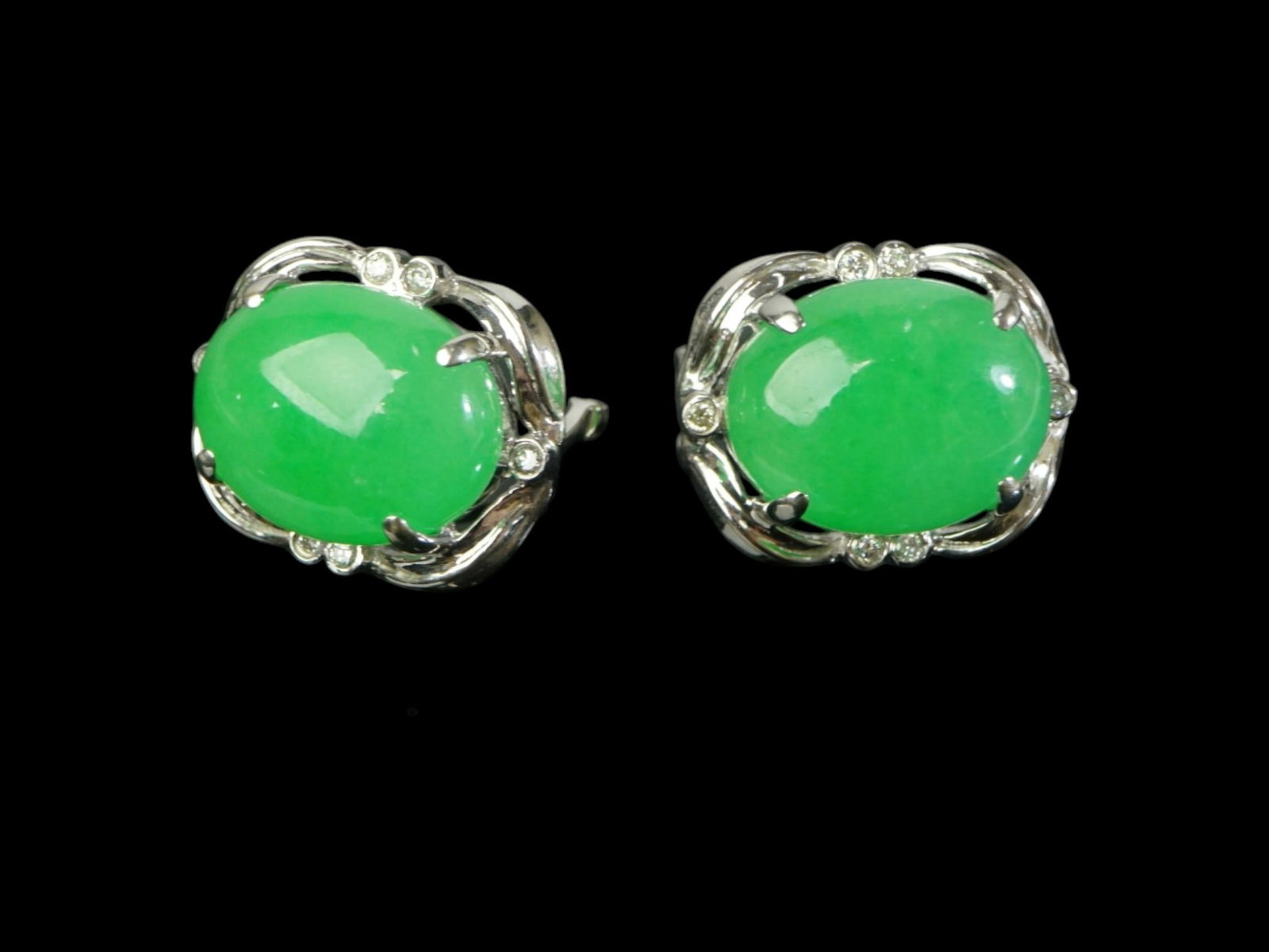 Pair of Chinese 18K White Gold And Jadeite Cabochon Clip-On Earrings: Approximate size: 3/4x5/8 in ,overall weight 58.4 ct. Shipping: We offer in-house shipping services for most small items. This means that we will take care of packing and shipping the items directly t