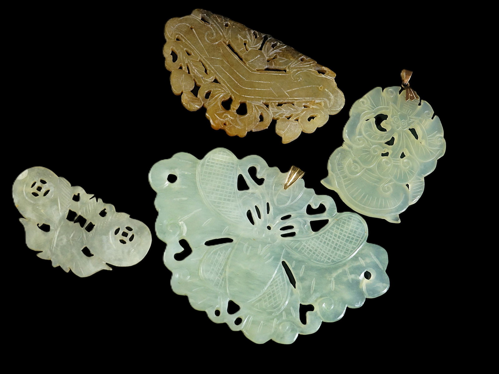Four Chinese Carved White Jade Pendants with 18K Gold Fittings: Approximate size: overall weight 521.3 ct. Shipping: We offer in-house shipping services for most small items. This means that we will take care of packing and shipping the items directly to you. For 