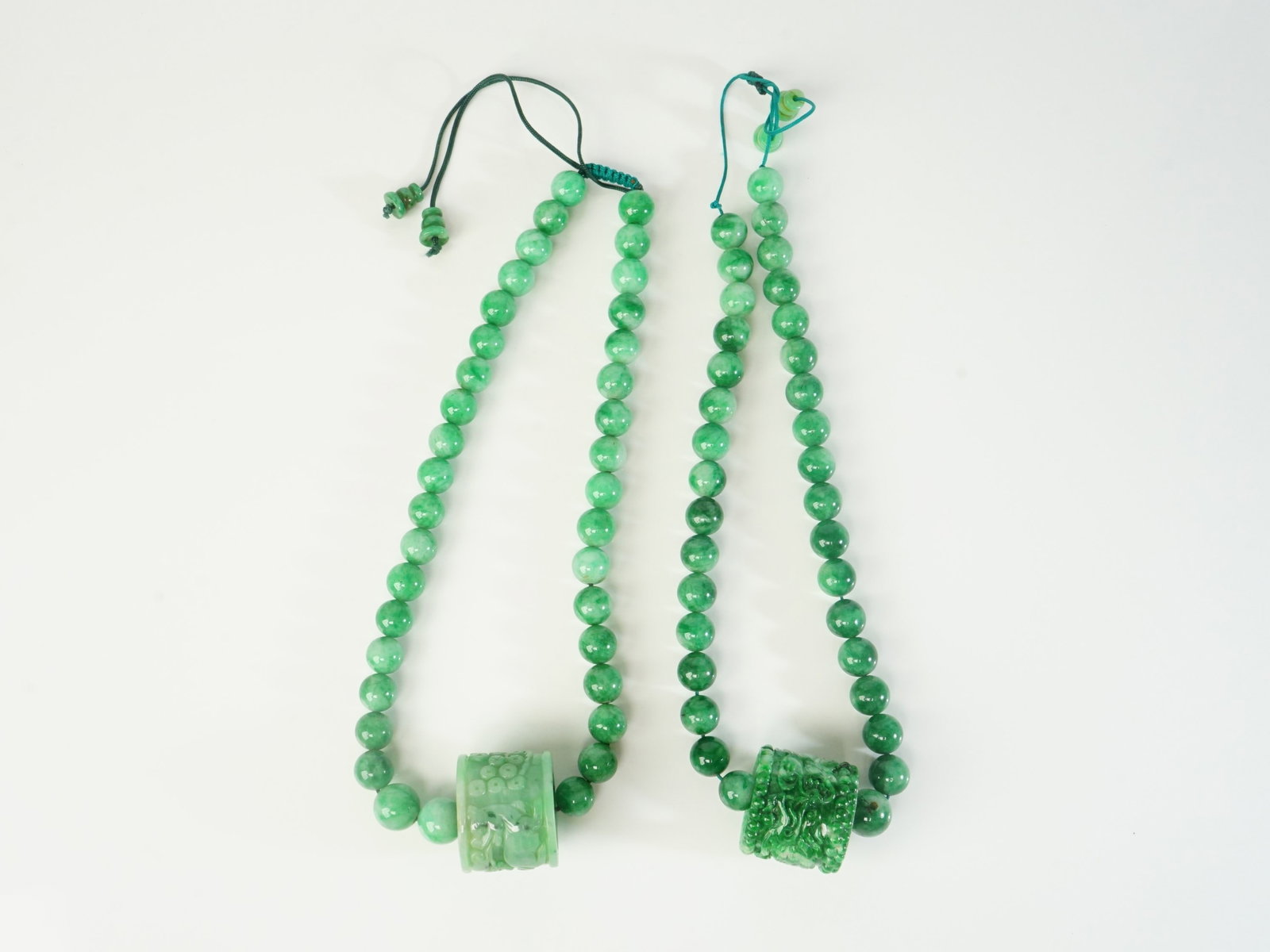 Two Chinese Bead Necklaces with Jadeite Archer'S Ring Pendant (1 of 6)