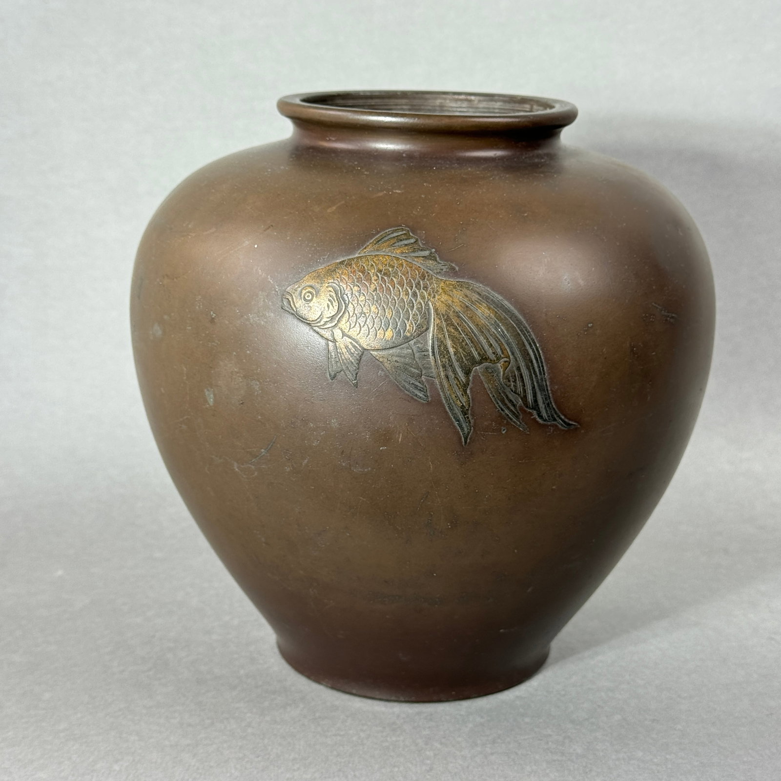 Japanese Bronze Vase with Gold Fish Scene: meiji period, 8"ht, unsigned Shipping: We offer in-house shipping services for most small items. This means that we will take care of packing and shipping the items directly to you. For larger or spec