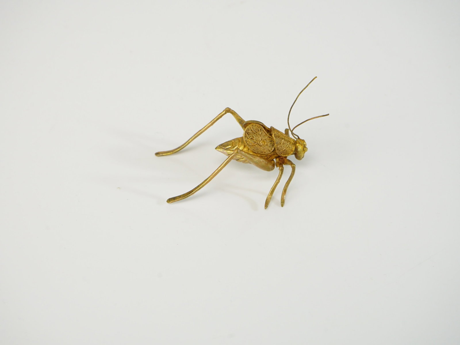 A Metal Cricket - 3