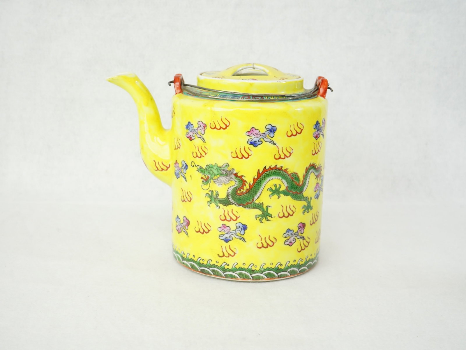 Chinese Export Yellow Ground Famille Rose Teapot: Approximate size: 6x7.25x5 in Shipping: We offer in-house shipping services for most small items. This means that we will take care of packing and shipping the items directly to you. For larger or spe