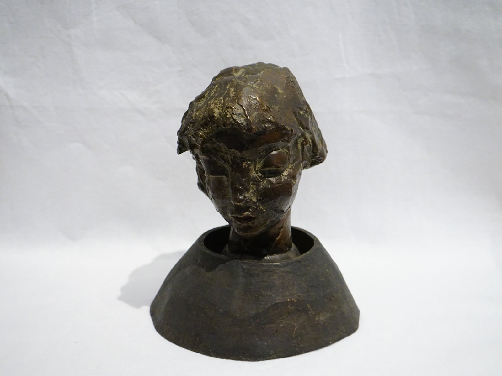 A Contemporary Modernist Patinated Bronze Bust of A Woman: Approximate size: 11x8.25x8.25 in Shipping: We offer in-house shipping services for most small items. This means that we will take care of packing and shipping the items directly to you. For larger or