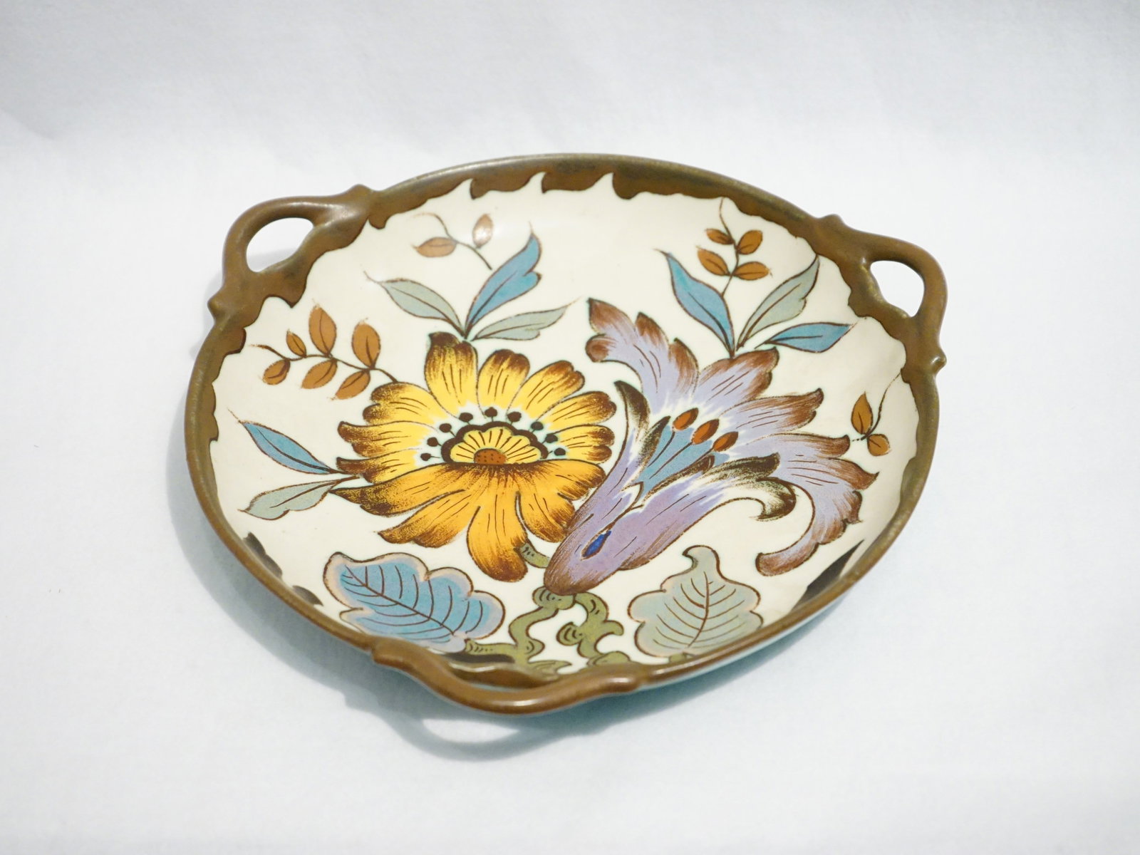 Royal Gouda 3 Handle Pottery Bowl. Signed By 'Dora Koninklijk': Approximate size: 1.5x11x11 in Shipping: We offer in-house shipping services for most small items. This means that we will take care of packing and shipping the items directly to you. For larger or sp