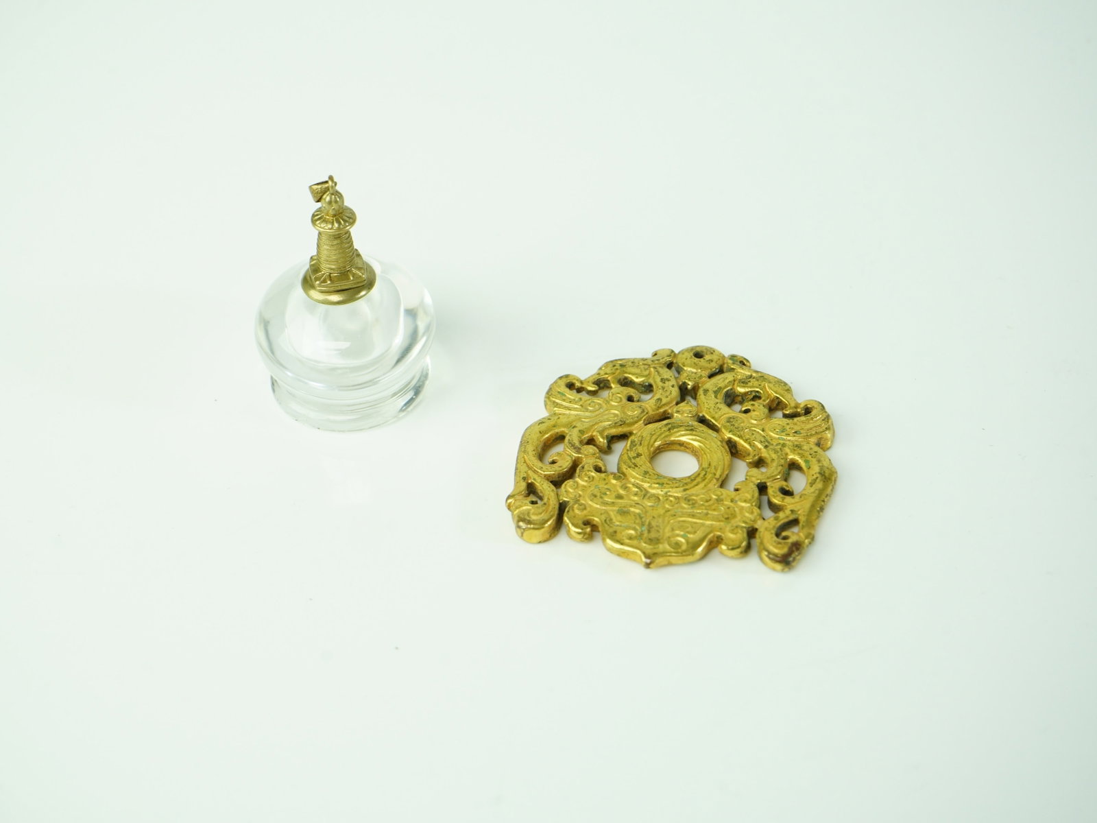 Two Chinese Gilt-Bronze Objects: Approximate size: 2.25x2.25x0.25 in/ H:2 in Shipping: We offer in-house shipping services for most small items. This means that we will take care of packing and shipping the items directly to you. For