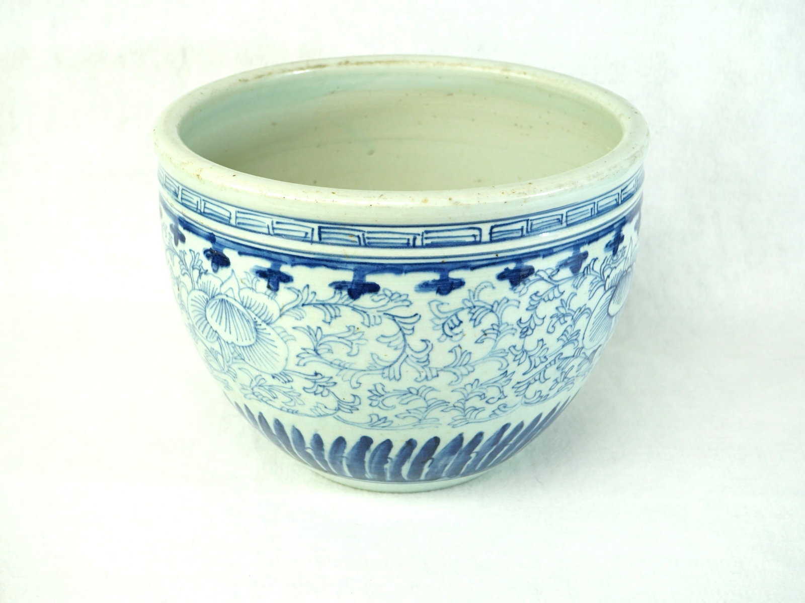 Chinese Blue and White 'Lotus Scroll' Jardiniere: Approximate size: 9.75x7.5x7.5 in Shipping: We offer in-house shipping services for most small items. This means that we will take care of packing and shipping the items directly to you. For larger