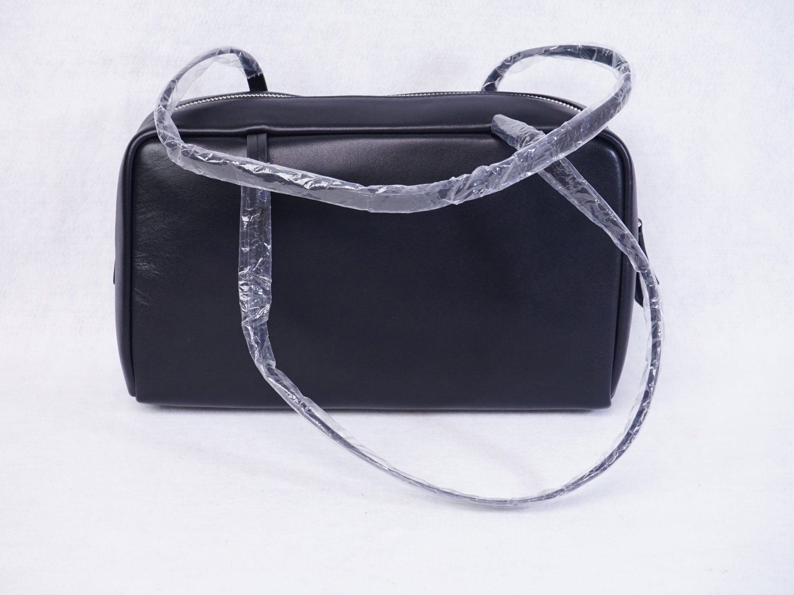 The Row Black Lambskin Leather Shoulder Bag Made in Italy: Approximate size:12.27x7.75x4 in Shipping: We offer in-house shipping services for most small items. This means that we will take care of packing and shipping the items directly to you. For larger or 