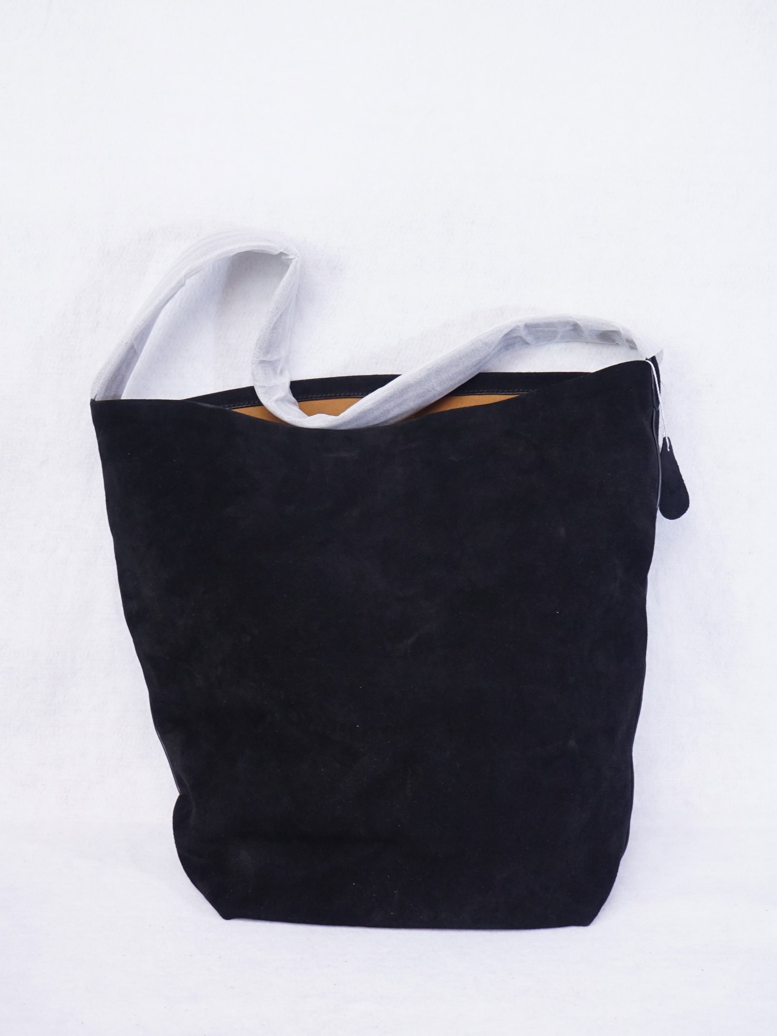 The Row Black Suede Leather Tote Shoulder Bag: Approximate size: 14x9.5x5 in Shipping: We offer in-house shipping services for most small items. This means that we will take care of packing and shipping the items directly to you. For larger or spe