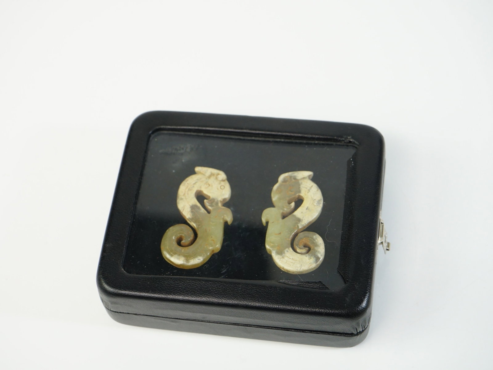 Pair of Chinese Neolithic Jade Dragon Pendants: Approximate size: 2x1x1/8 in(each) Shipping: We offer in-house shipping services for most small items. This means that we will take care of packing and shipping the items directly to you. For larger o