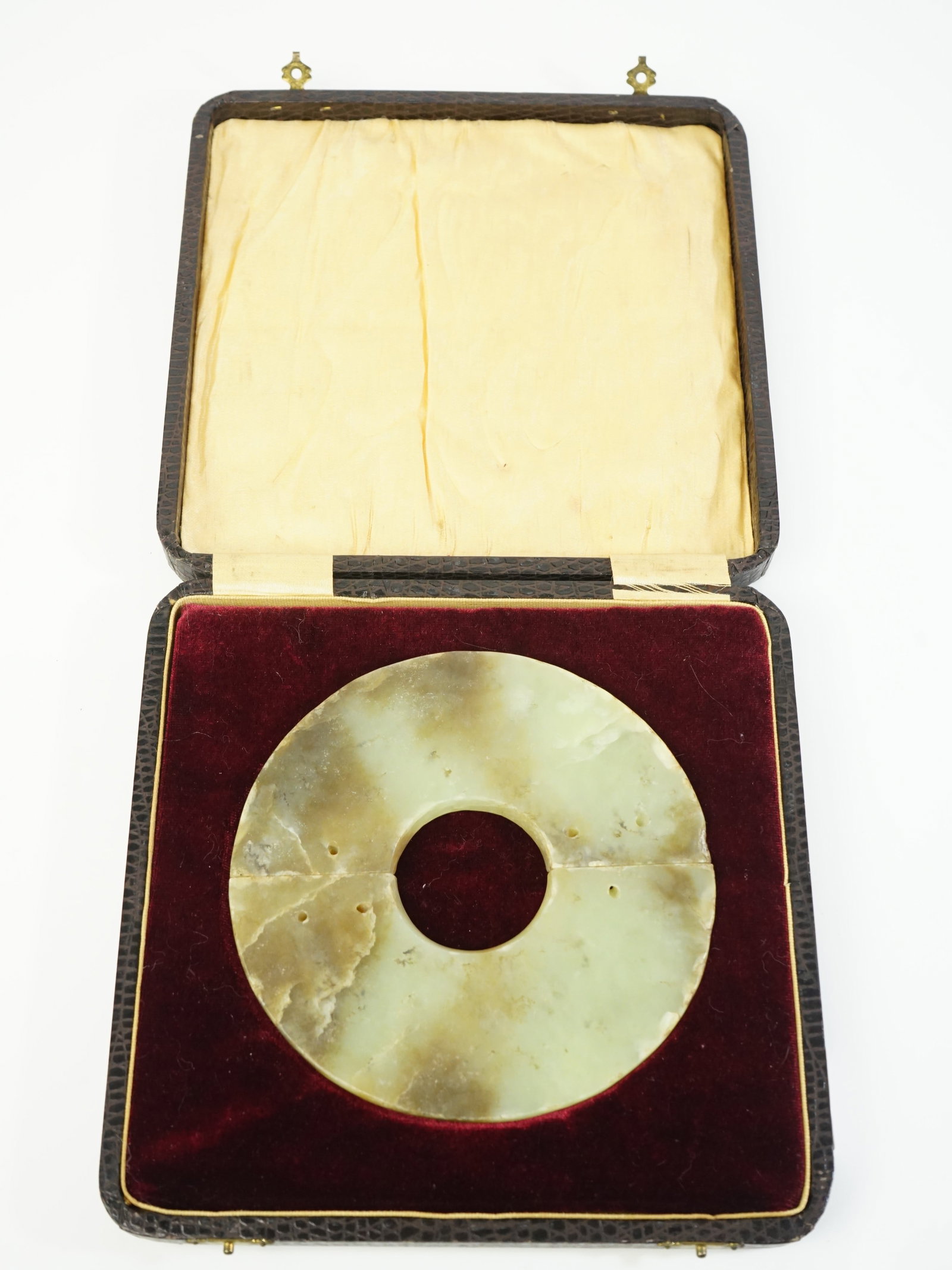 Pair of Chinese Neolithic Jade Huang Pendants: Approximate size:overall 5x5x1/8 in Shipping: We offer in-house shipping services for most small items. This means that we will take care of packing and shipping the items directly to you. For larger 