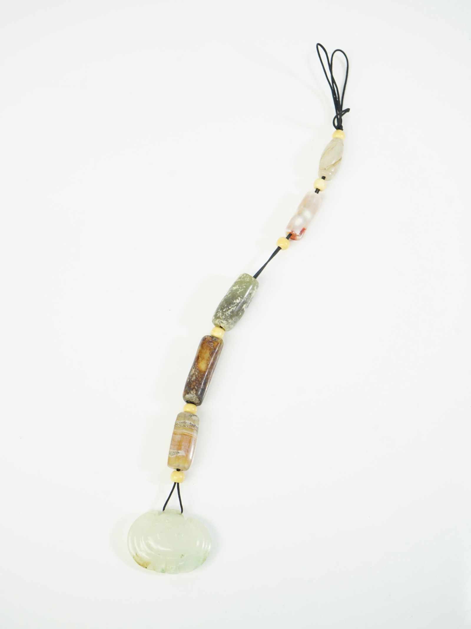 Chinese Multi Stone Bead Necklace with Jade Bat-Form Pendant: Approximate size: in Shipping: We offer in-house shipping services for most small items. This means that we will take care of packing and shipping the items directly to you. For larger or specialized 