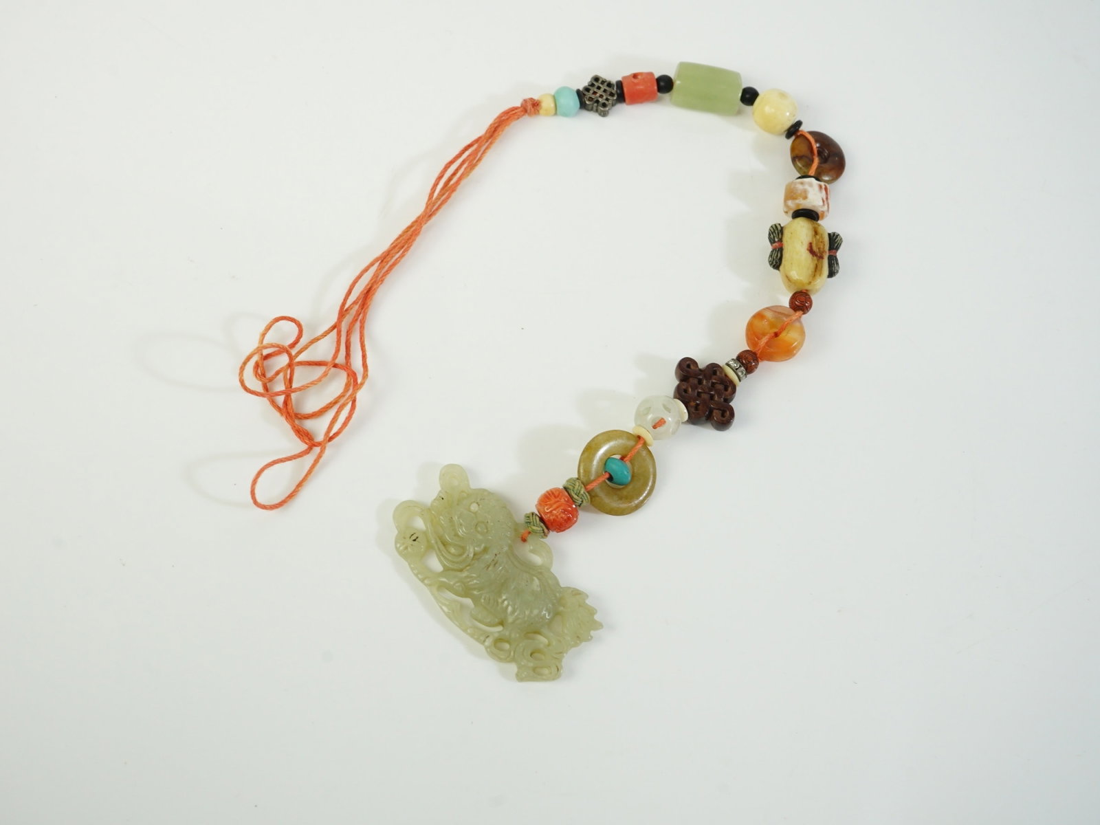Chinese Multi Stone Bead Necklace with Jade Foo Dog Pendant: Approximate size: L 15 in ,pendant 2.25x1 1/8 in Shipping: We offer in-house shipping services for most small items. This means that we will take care of packing and shipping the items directly to you