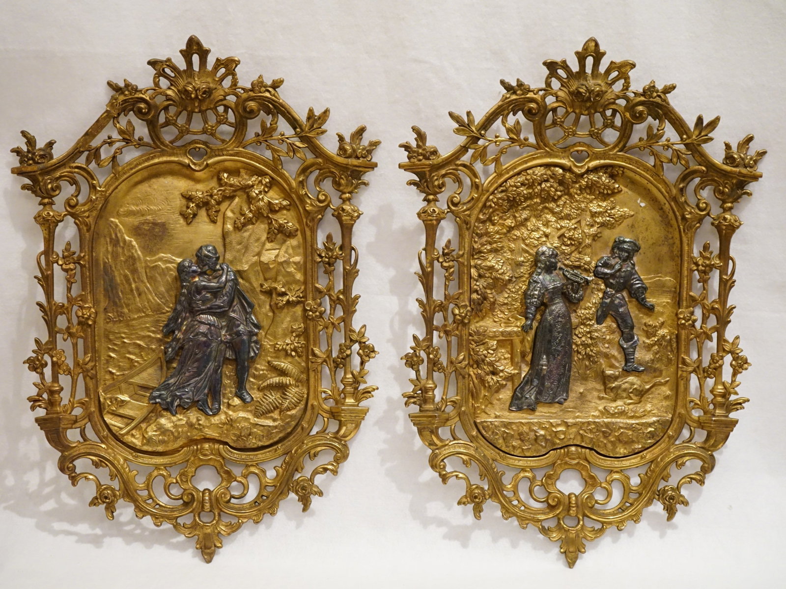 A Pair of Vintage Cast Iron Romeo and Juliet Relief Wall Plaques: Approximate size:21x14 in(each) Shipping: We offer in-house shipping services for most small items. This means that we will take care of packing and shipping the items directly to you. For larger or s
