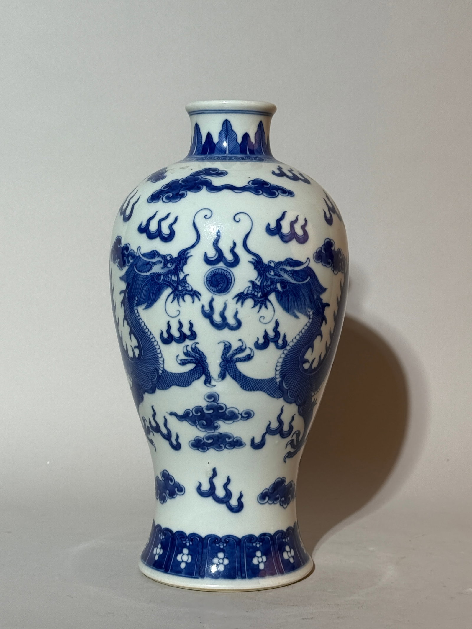 A Chinese Blue White Porcelain Dragon Vase: 12"ht, four character mark at bottom Shipping: We offer in-house shipping services for most small items. This means that we will take care of packing and shipping the items directly to you. For larger