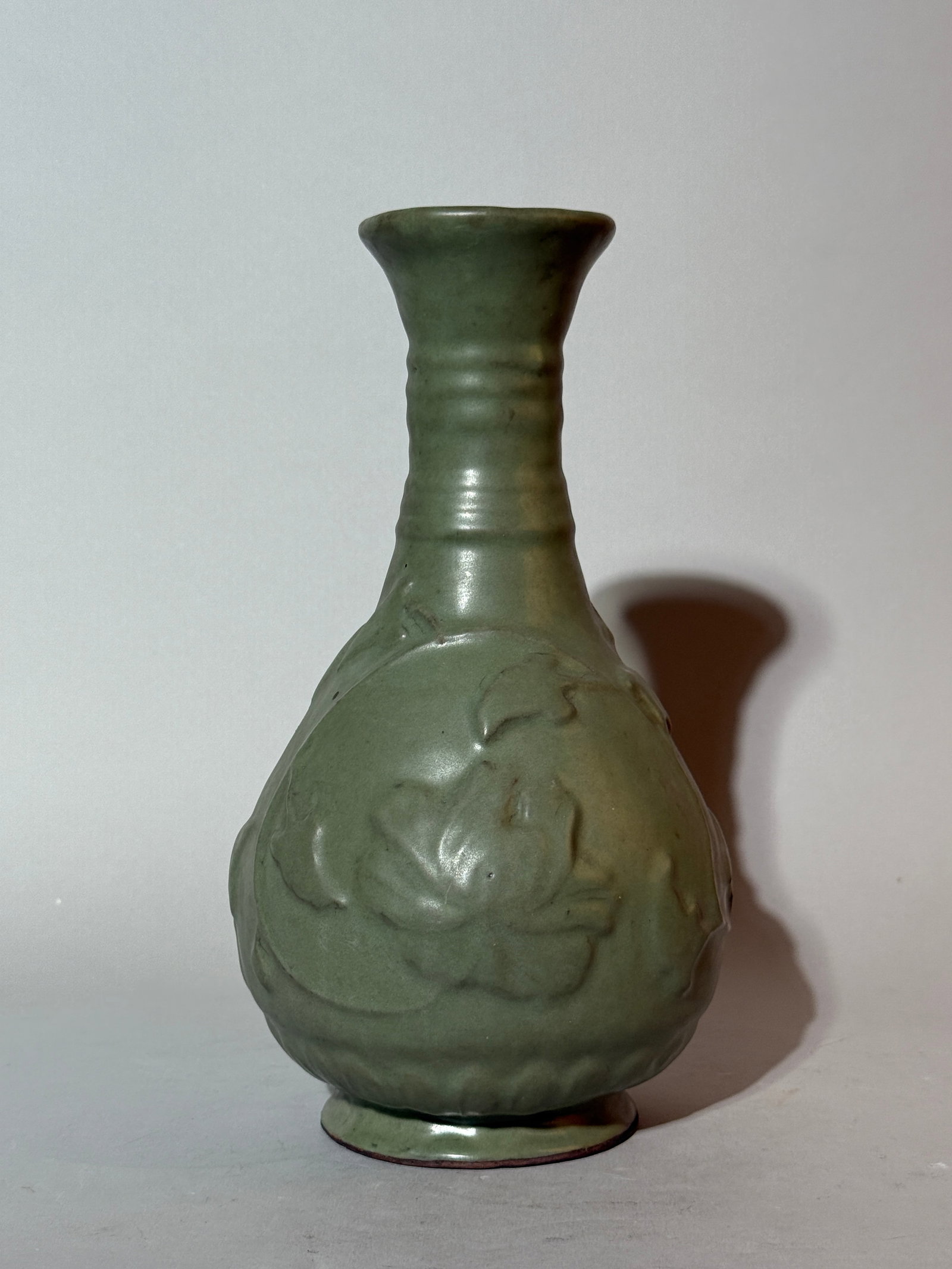 A Chinese Longquan Celadon-Glazed Relief-Decorated 'Peony' Vase (1 of 13)