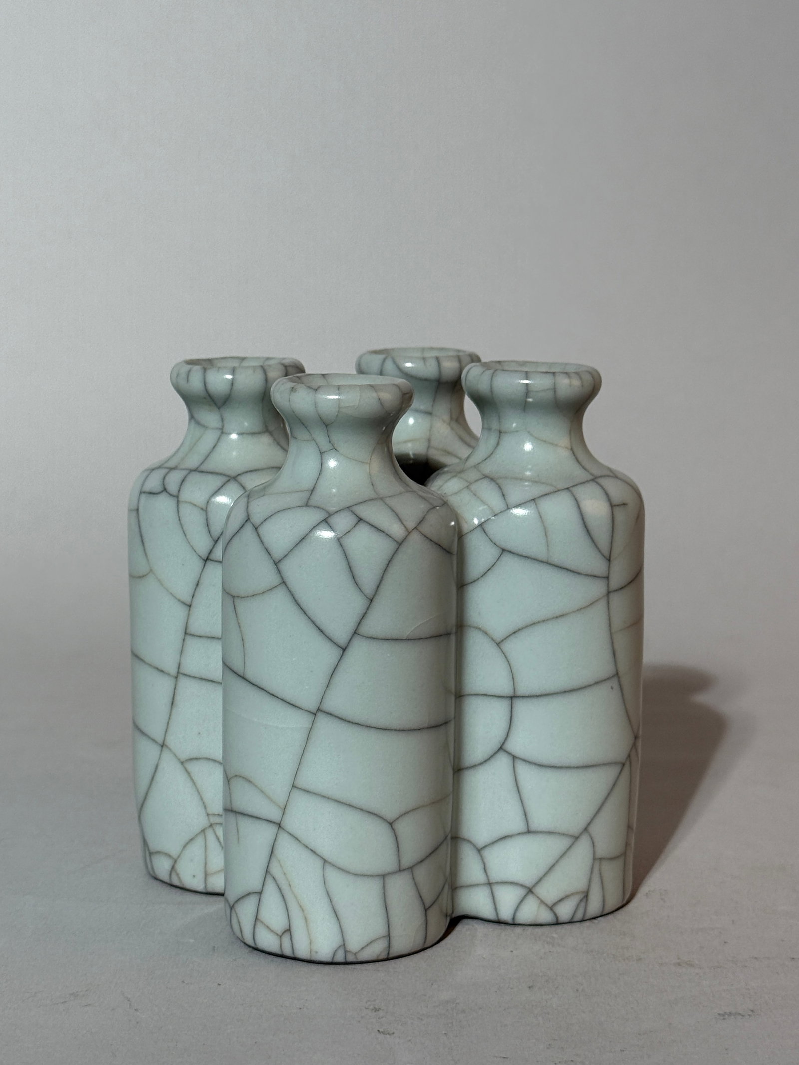 A Chinese Guan-Type Quadruple Vase: 4.25"ht Shipping: We offer in-house shipping services for most small items. This means that we will take care of packing and shipping the items directly to you. For larger or specialized items, we