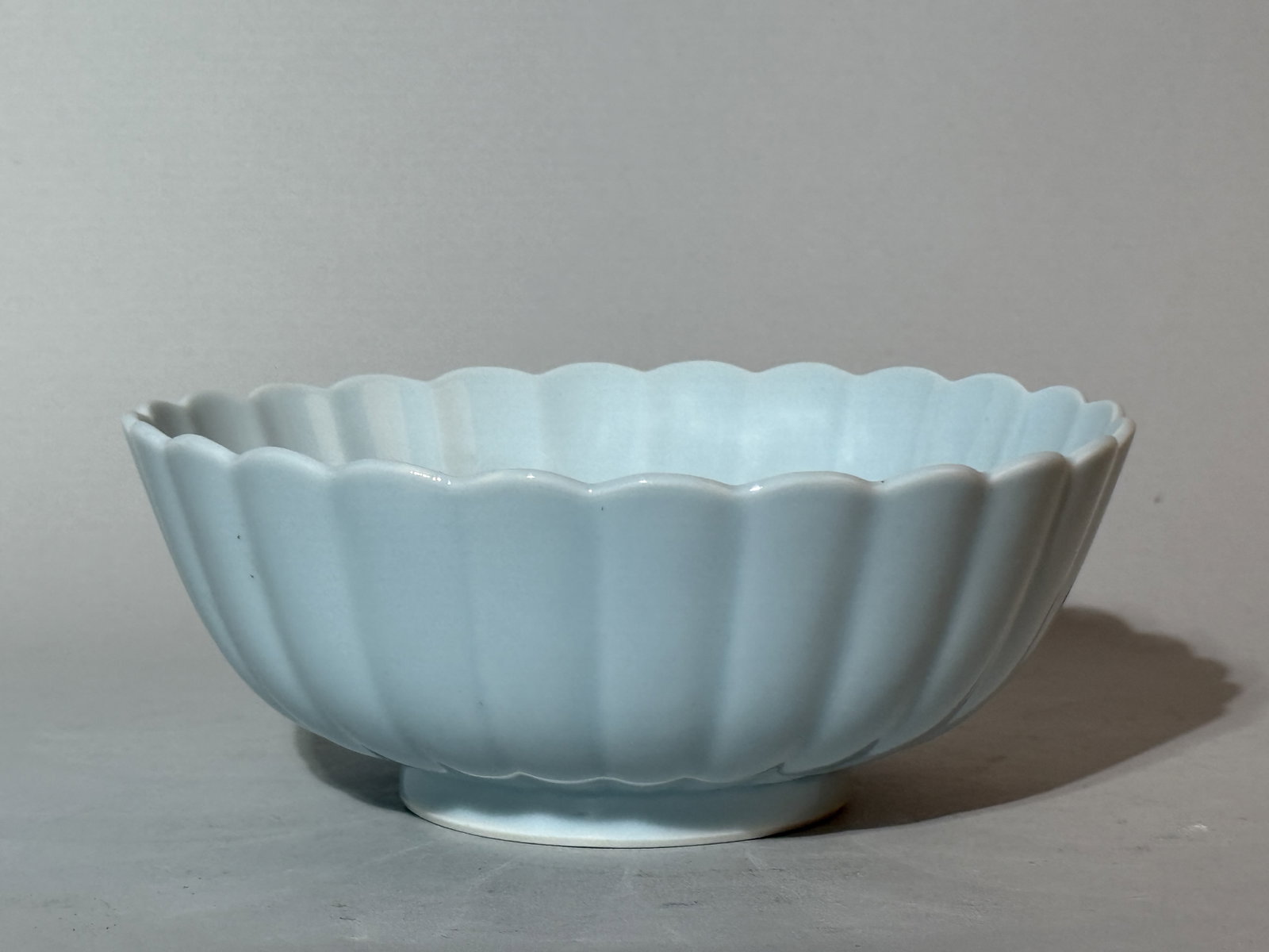 A Chinese Clair-De-Lune Lobed Porcelain Bowl: 8"dia 3.25"ht, unsigned Shipping: We offer in-house shipping services for most small items. This means that we will take care of packing and shipping the items directly to you. For larger or