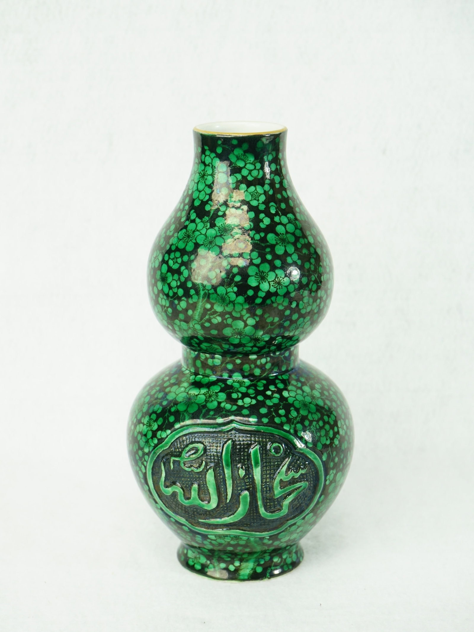 Chinese Green-Ground 'Prunus' Double-Gourd Vase with Mark: Approximate size: H:7.75 in Shipping: We offer in-house shipping services for most small items. This means that we will take care of packing and shipping the items directly to you. For larger or