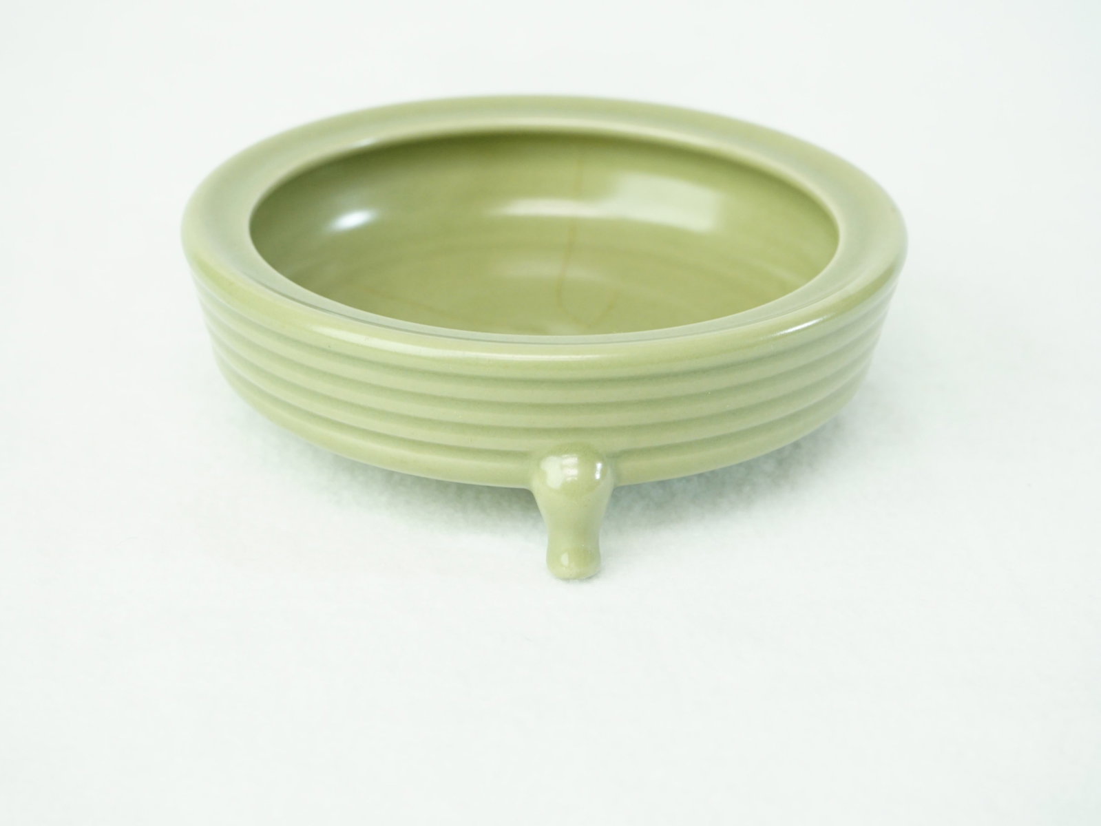 Chinese Longquan Celadon Tripod Censer: Approximate size: 1.5x5.25x5.25 in Shipping: We offer in-house shipping services for most small items. This means that we will take care of packing and shipping the items directly to you. For larger