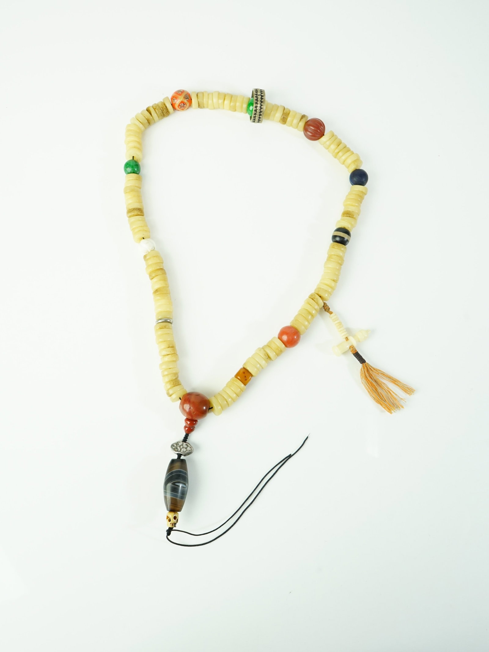 Tibetan Dzi Bead, Bone and Hardstone Necklace: Approximate size: L 22 in,large bead L 1.25 in. Shipping: We offer in-house shipping services for most small items. This means that we will take care of packing and shipping the items directly to you.