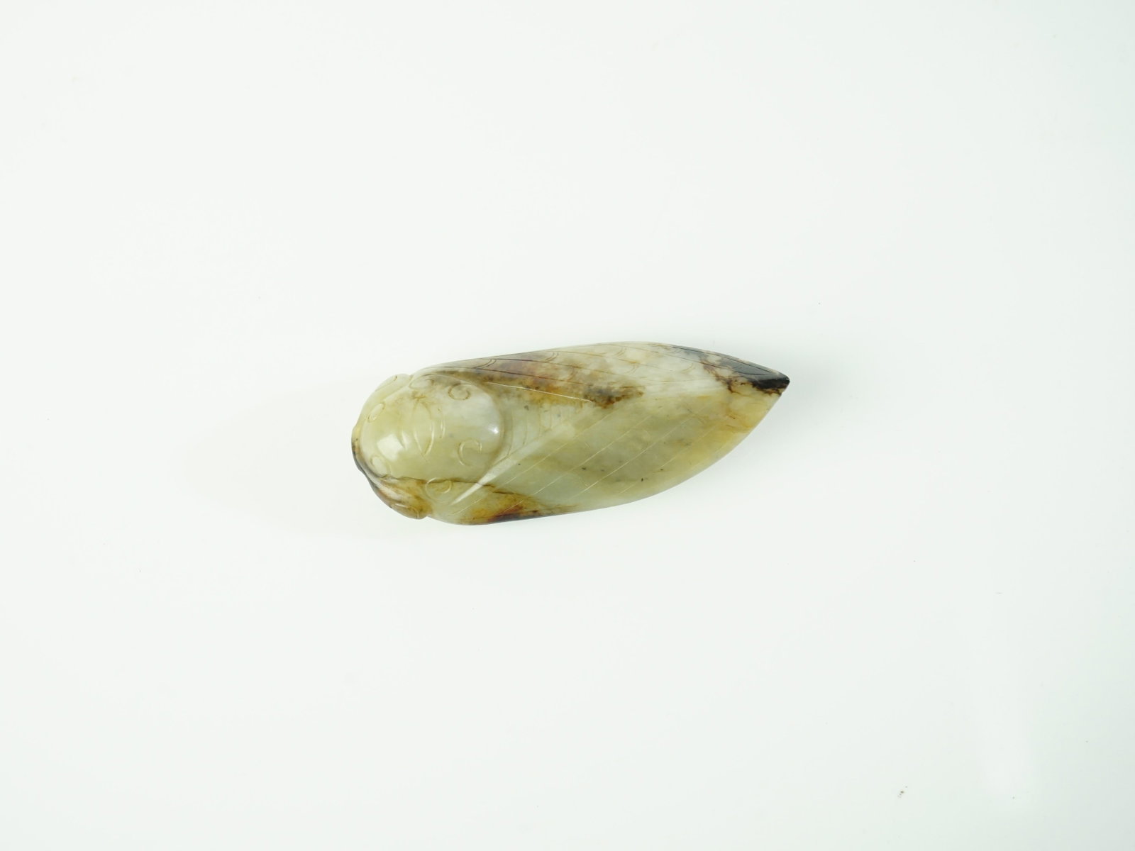 Chinese Carved Celadon and Russet Cicada: Approximate size:3x1.25x0.75 in Shipping: We offer in-house shipping services for most small items. This means that we will take care of packing and shipping the items directly to you. For larger or