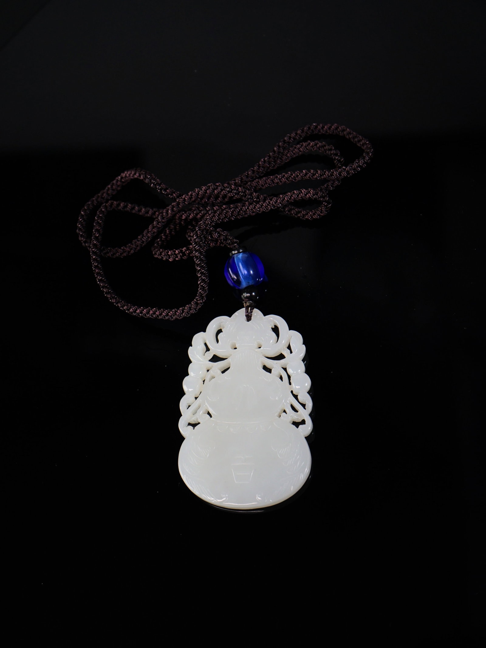 Chinese Carved White Jade Gourd-Form Plaque: Approximate size: 2x1.25x3/16 in Shipping: We offer in-house shipping services for most small items. This means that we will take care of packing and shipping the items directly to you. For larger or