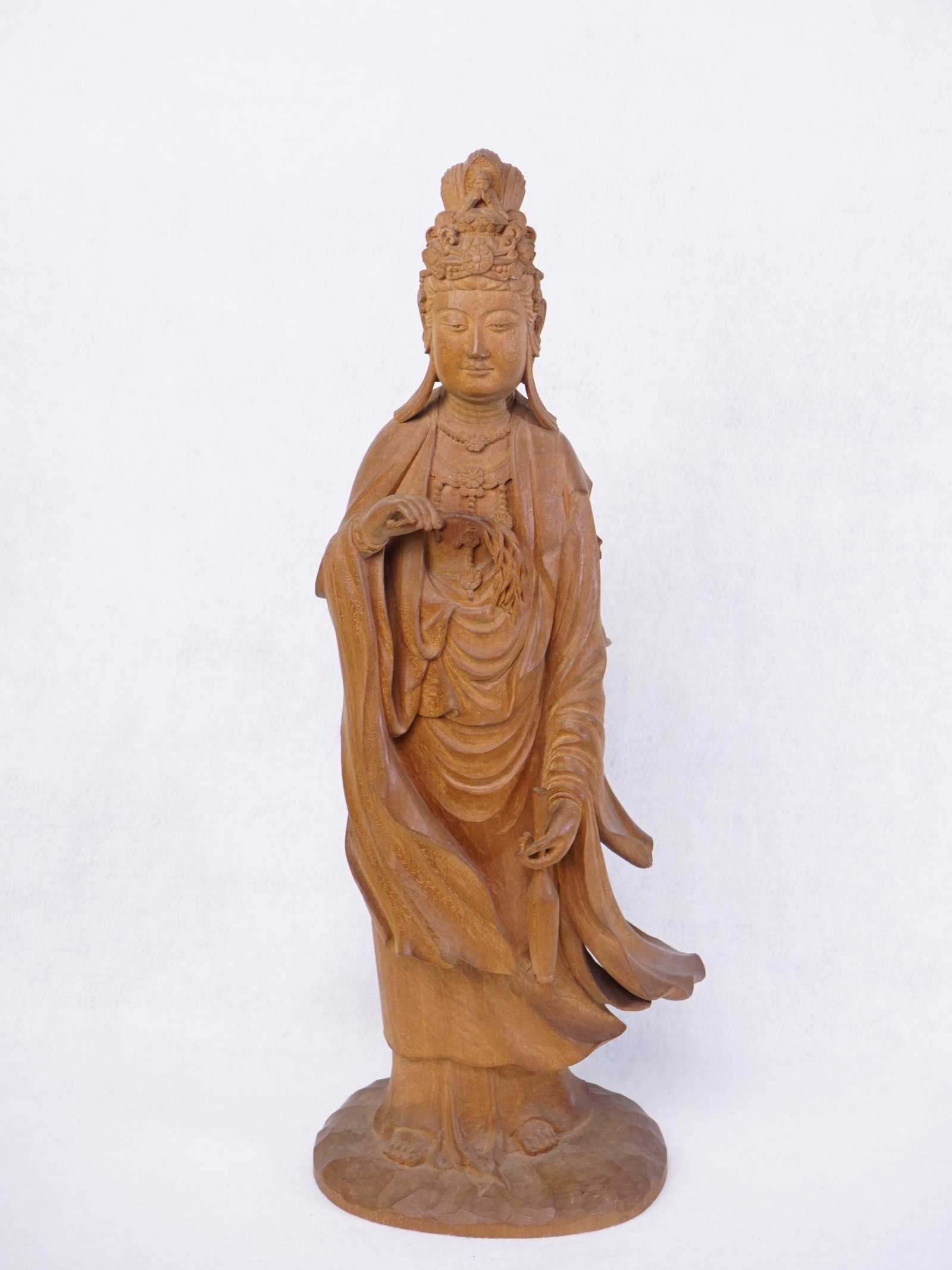 Japanese Carved Wood Figure of Kannon: Approximate size: H:18.5 in Shipping: We offer in-house shipping services for most small items. This means that we will take care of packing and shipping the items directly to you. For larger or
