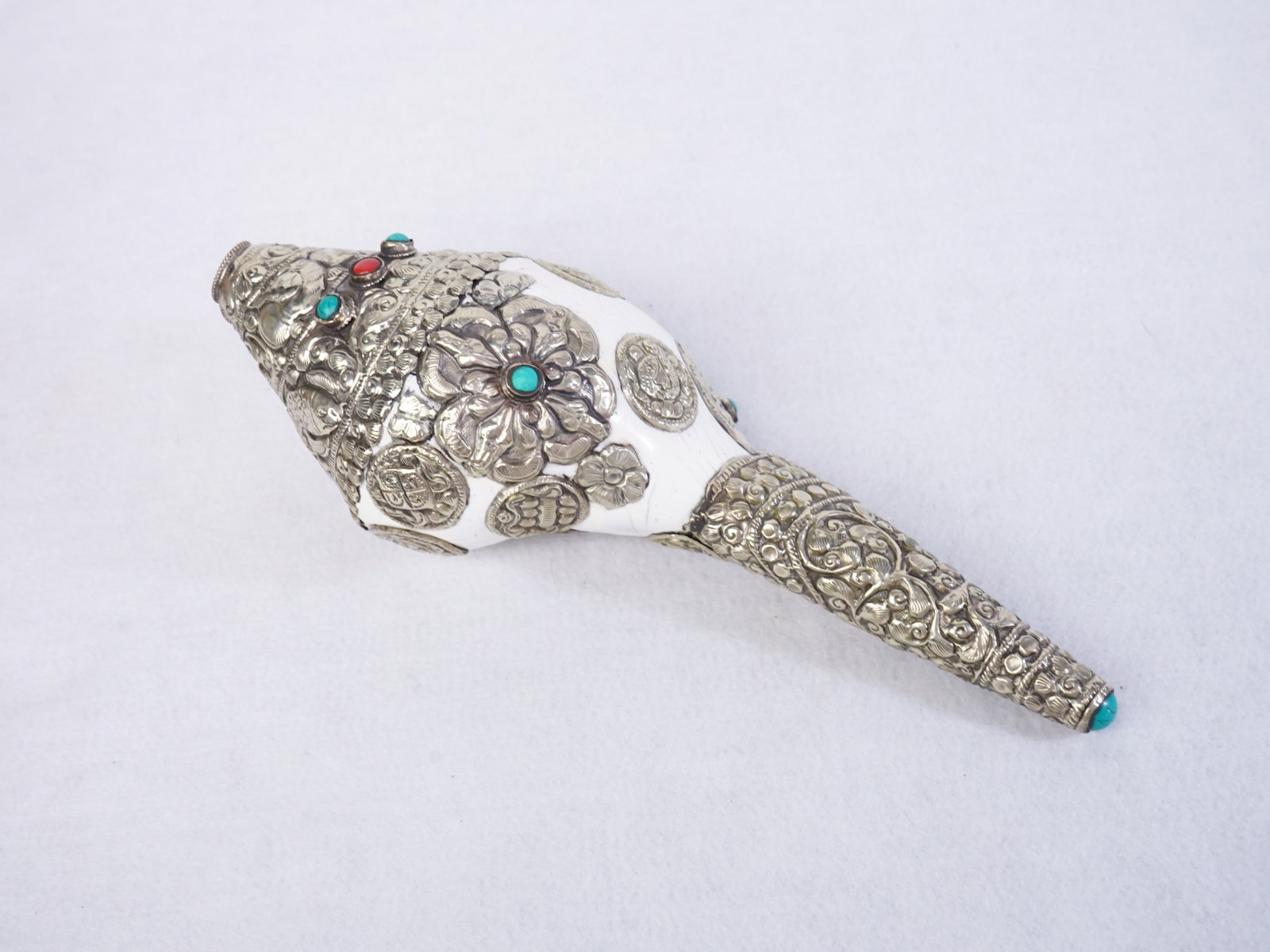 Tibetan Silver Conch Shell Trumpet: Approximate size: 11x4.25x3.5 in Shipping: We offer in-house shipping services for most small items. This means that we will take care of packing and shipping the items directly to you. For larger or