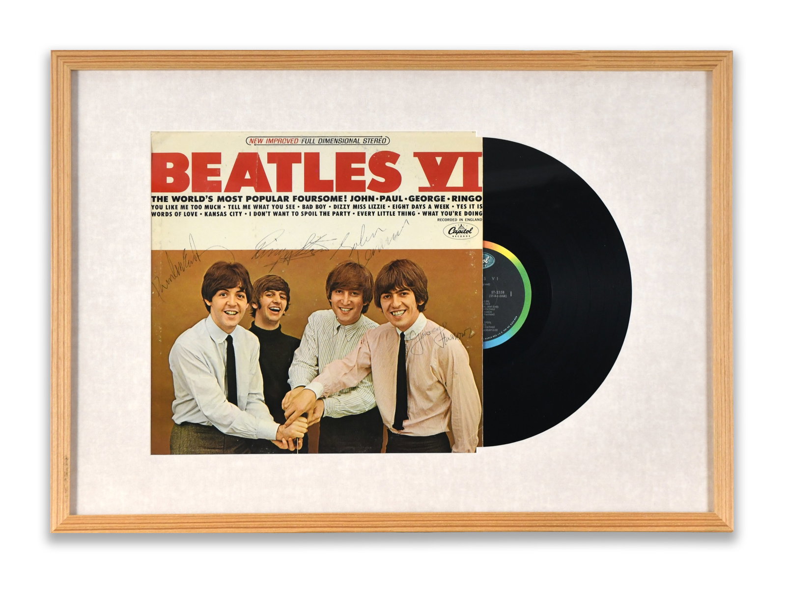 The Beatles-Fully Signed Beatles Vi (Capitol Records) LP Display: THE BEATLES - FULLY SIGNED BEATLES VI (CAPITOL RECORDS) LP DISPLAY Provenance and Authenticity: This framed presentation features the Capitol Records LP Beatles VI, signed by all four members of The B