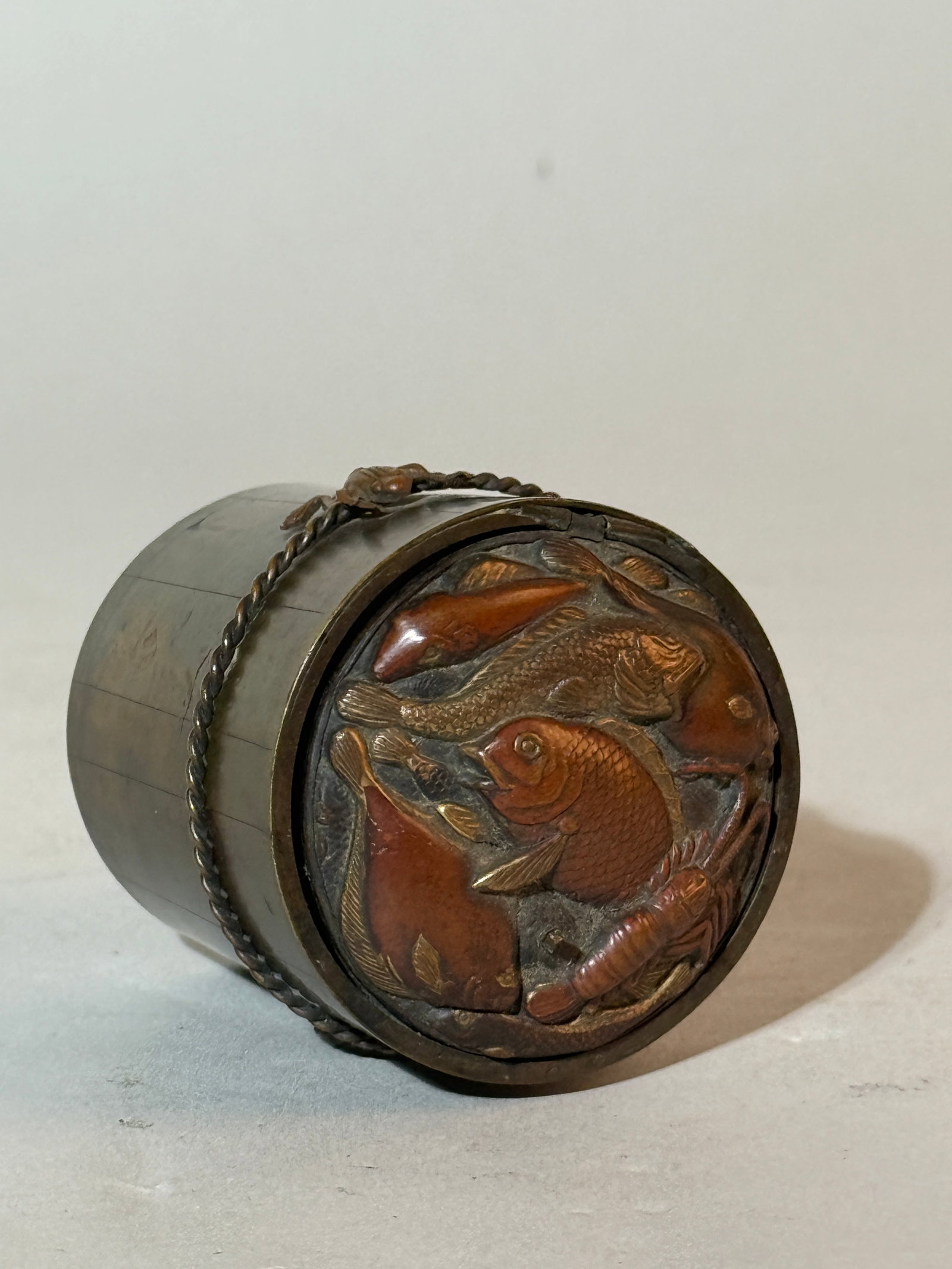 Japanese Mixed Metal Miniture Box with Fish: meiji period, 2.25"ht Shipping: We offer in-house shipping services for most small items. This means that we will take care of packing and shipping the items directly to you. For larger or