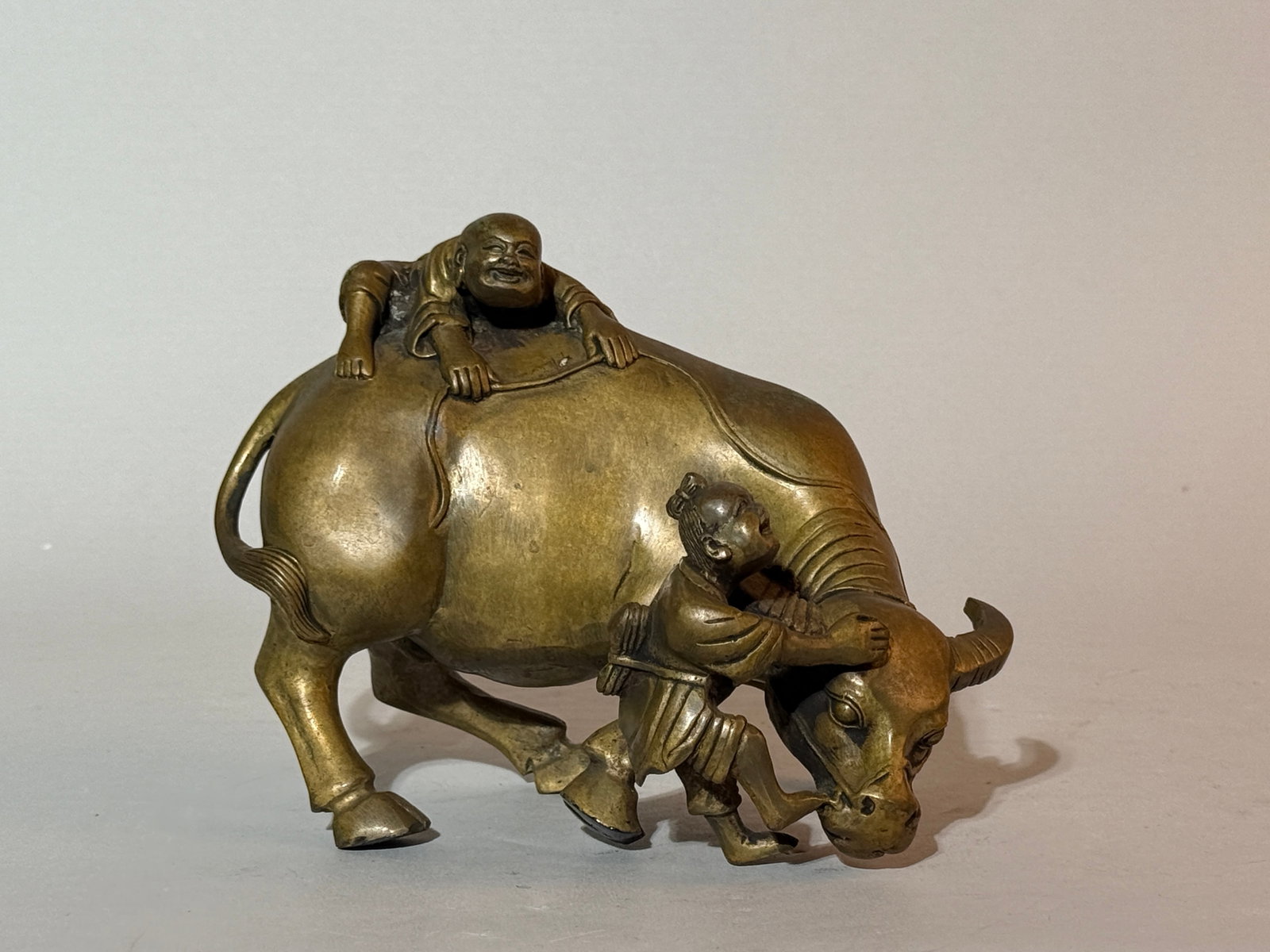 A Japanese Bronze Okimono of a Boy and OX: boys with ox, 6.5"w Shipping: We offer in-house shipping services for most small items. This means that we will take care of packing and shipping the items directly to you. For larger or specialized i