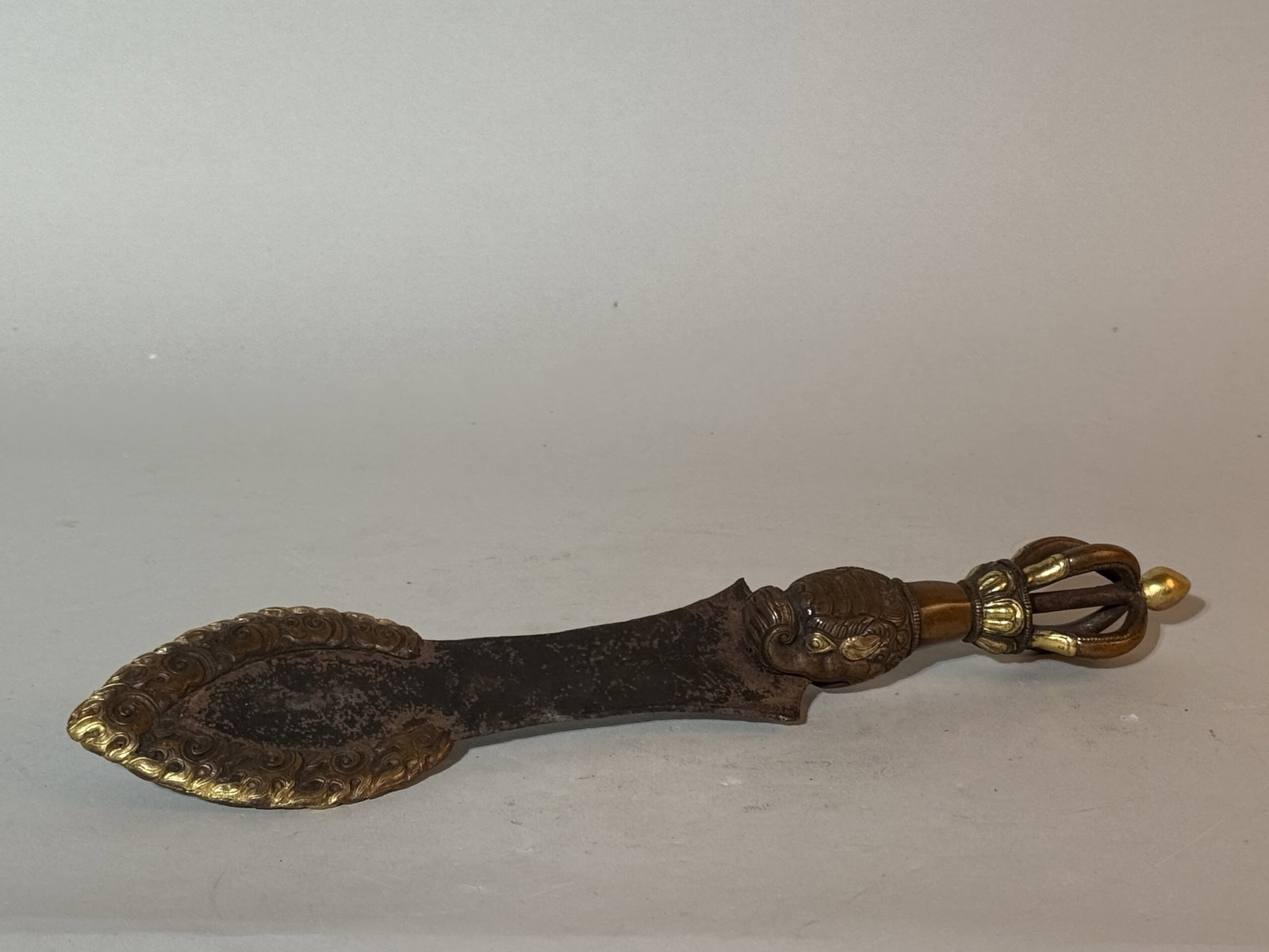 Tibetan Ceremonial Bronze Dagger: 13"L Shipping: We offer in-house shipping services for most small items. This means that we will take care of packing and shipping the items directly to you. For larger or specialized items, we recomm