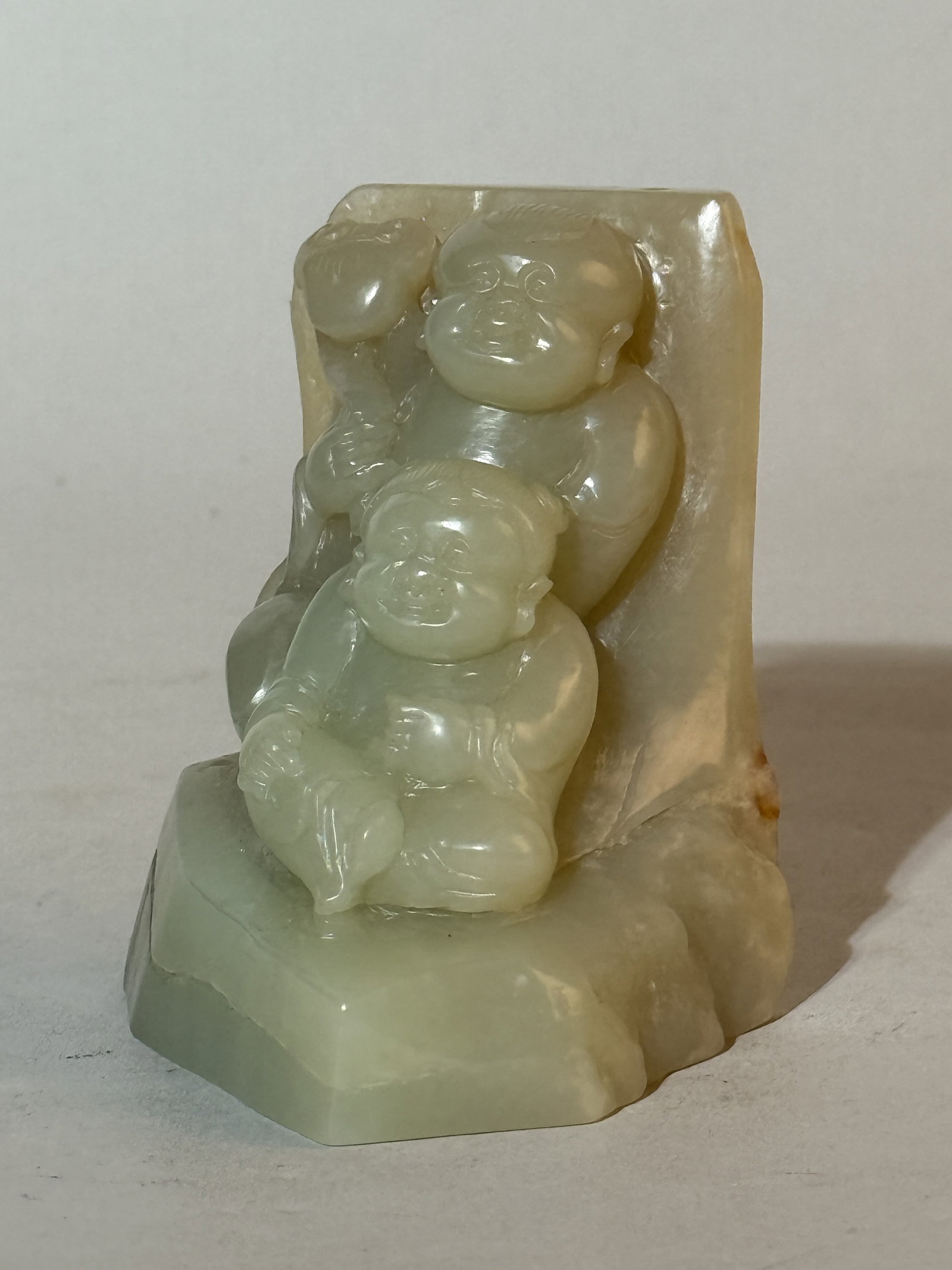 A Chinese Carved Jade 'Two Boys' Boulder: 3.25"ht Shipping: We offer in-house shipping services for most small items. This means that we will take care of packing and shipping the items directly to you. For larger or specialized items, we rec
