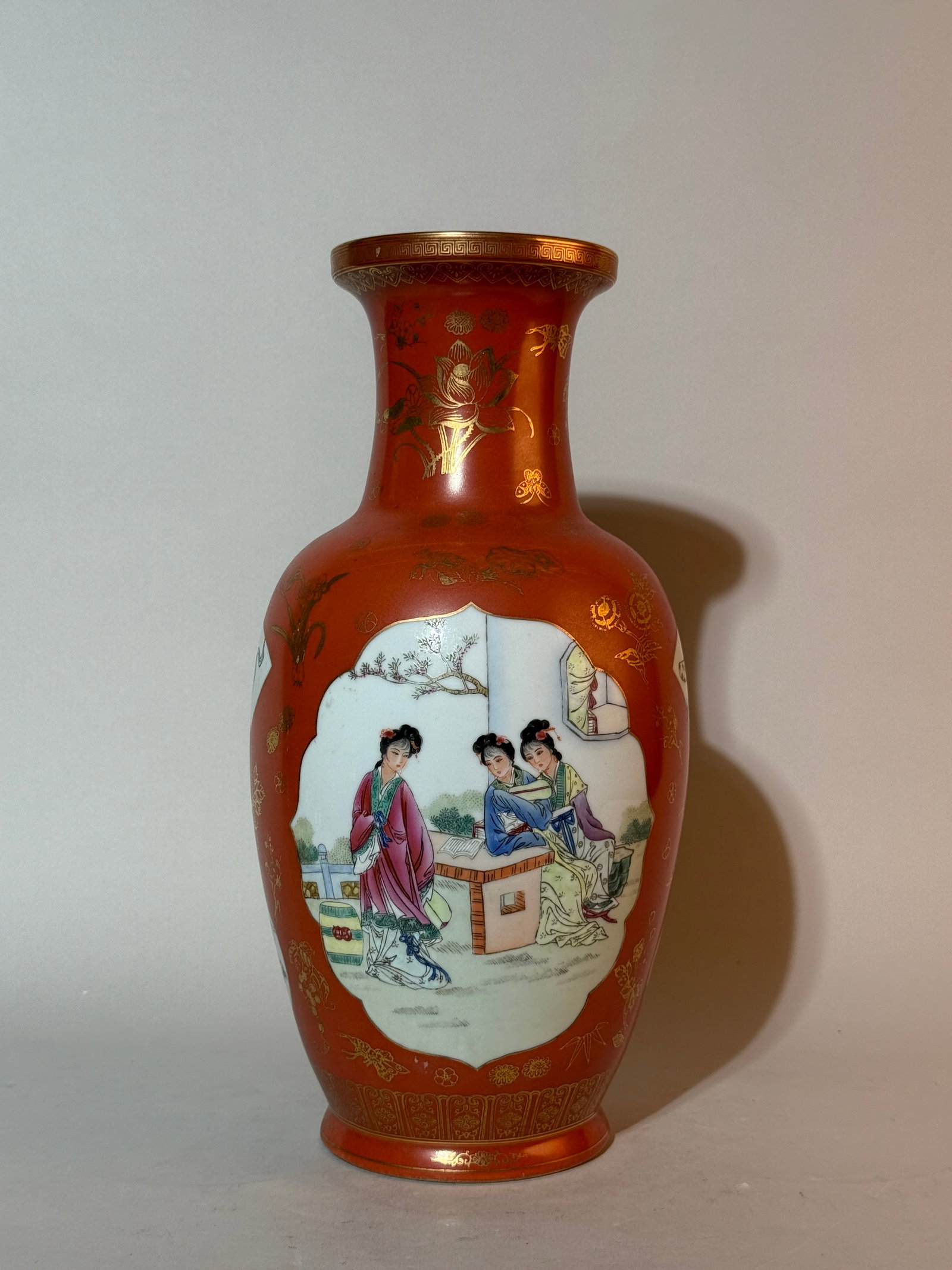 A Chinese Coral-Red-Ground 'Ladies' Vase: 14.5"ht Shipping: We offer in-house shipping services for most small items. This means that we will take care of packing and shipping the items directly to you. For larger or specialized items, we rec
