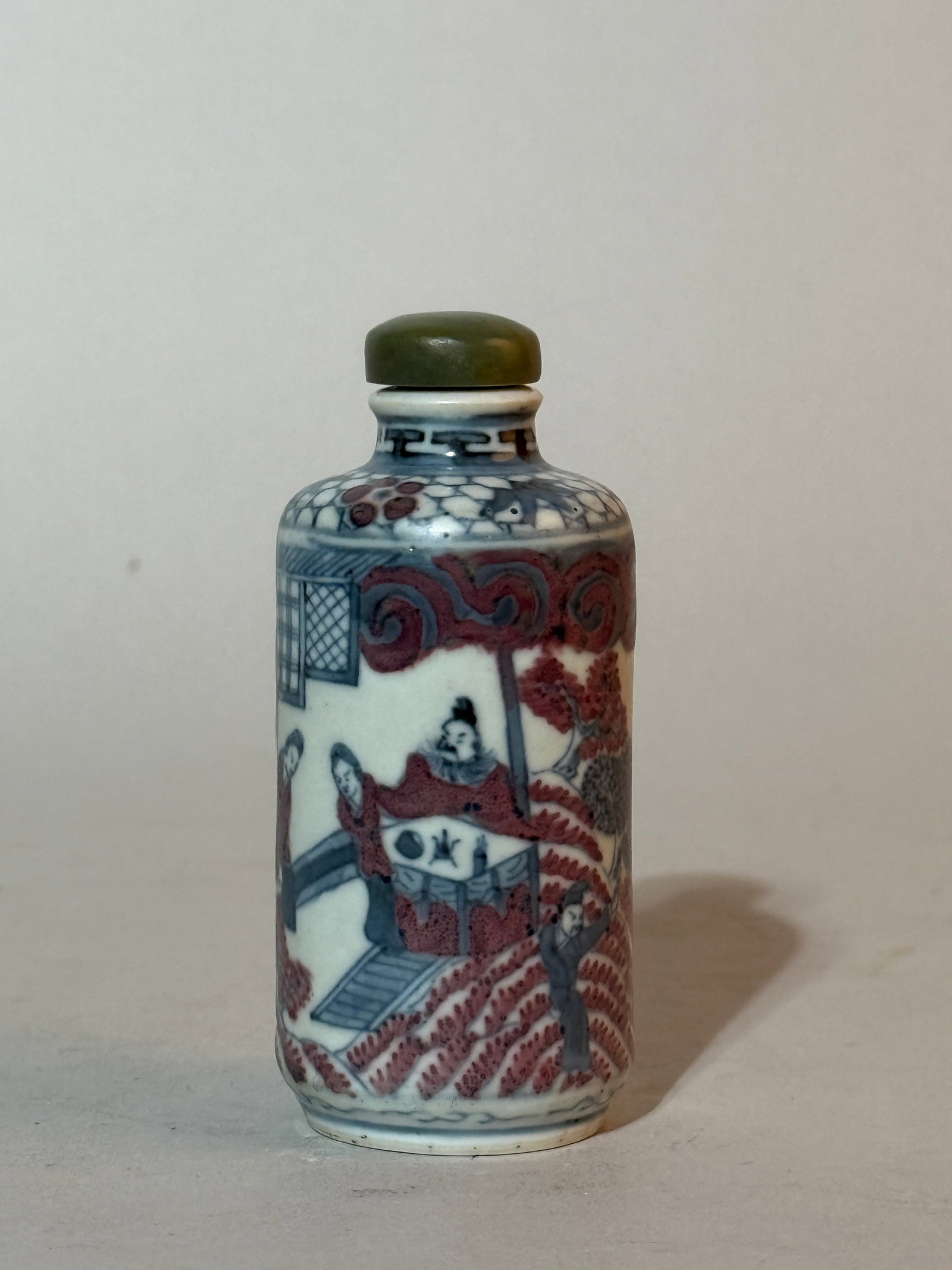 A Chinese Underglaze-Blue and Copper-Red 'Figural' Snuff Bottle (1 of 11)