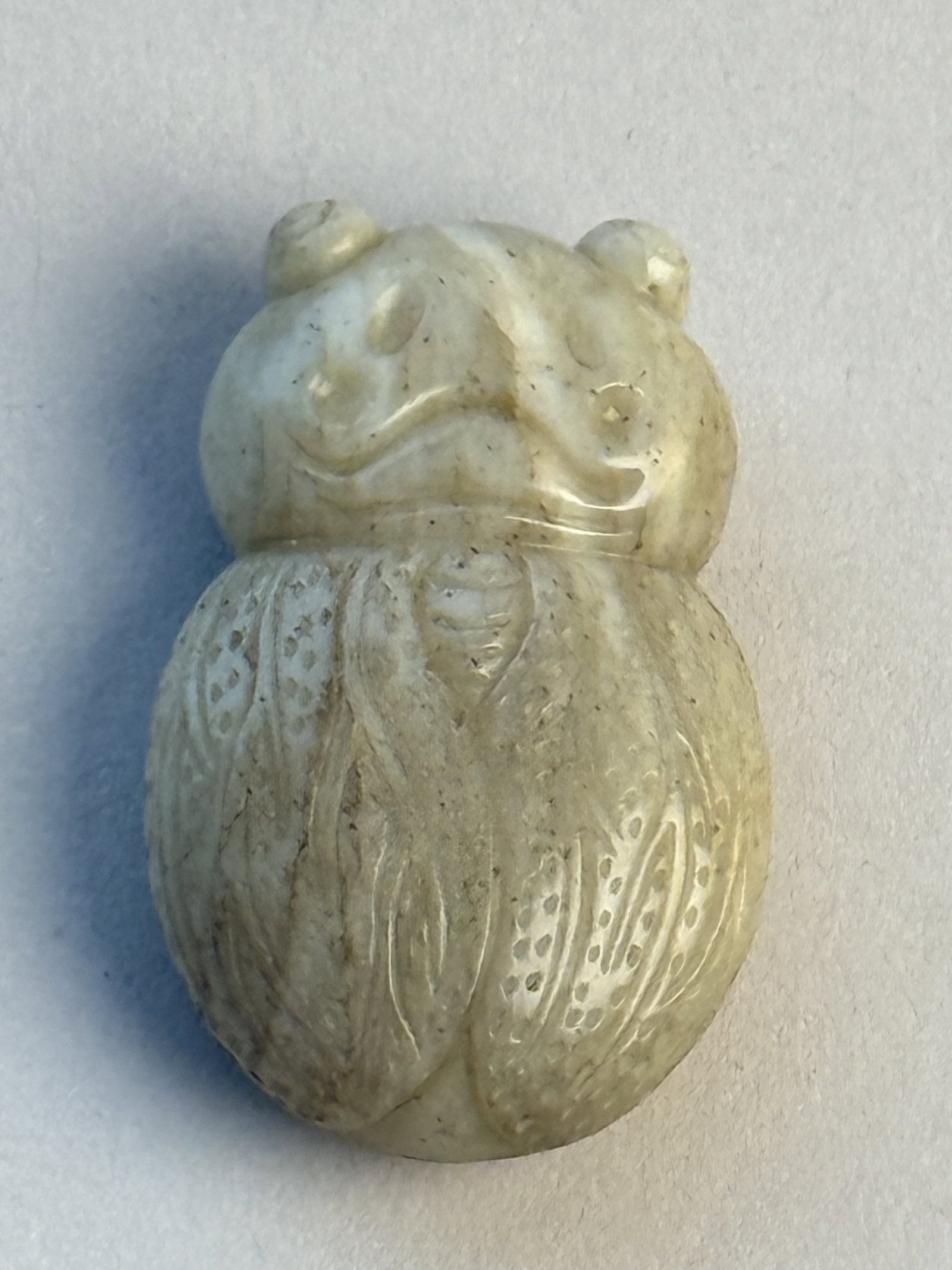 A Chinese Carved Jade Insect: 1.5"L Shipping: We offer in-house shipping services for most small items. This means that we will take care of packing and shipping the items directly to you. For larger or specialized items, we recom
