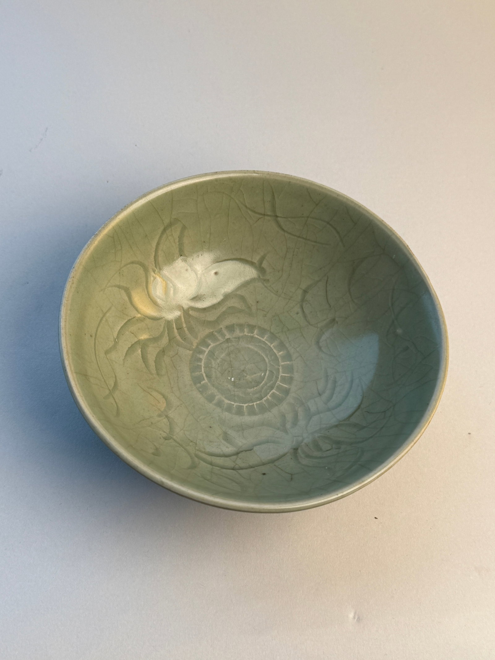 A Chinese Carved Celadon-Glazed Bowl: 6"dia Shipping: We offer in-house shipping services for most small items. This means that we will take care of packing and shipping the items directly to you. For larger or specialized items, we recom