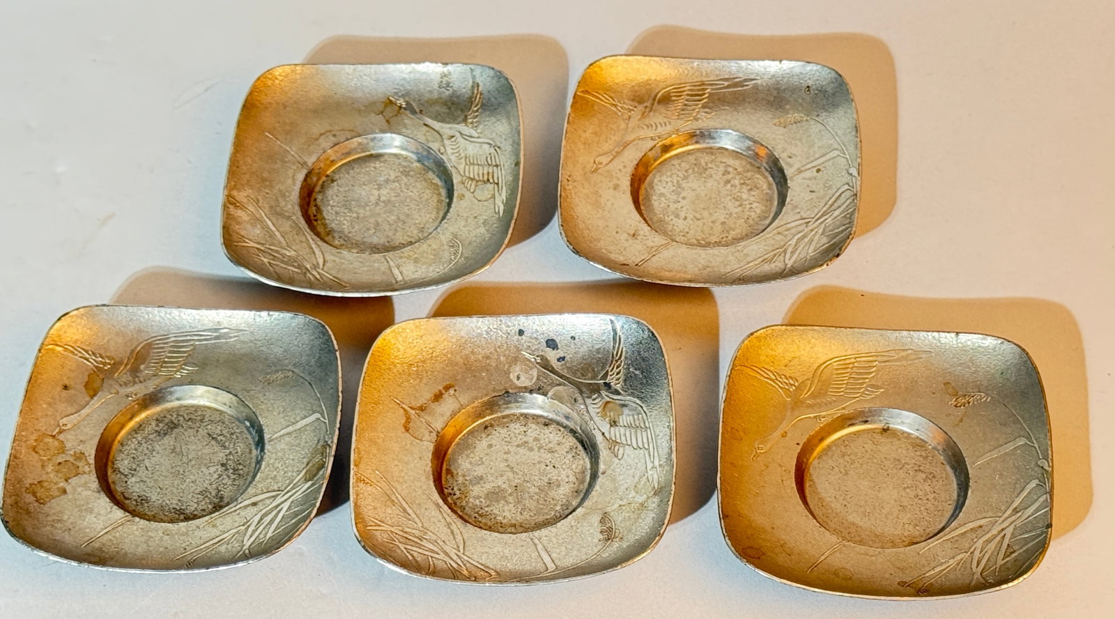 A Set of Five Japanese Pewter Chawan Stands: 4.5" at widest point Shipping: We offer in-house shipping services for most small items. This means that we will take care of packing and shipping the items directly to you. For larger or specialized
