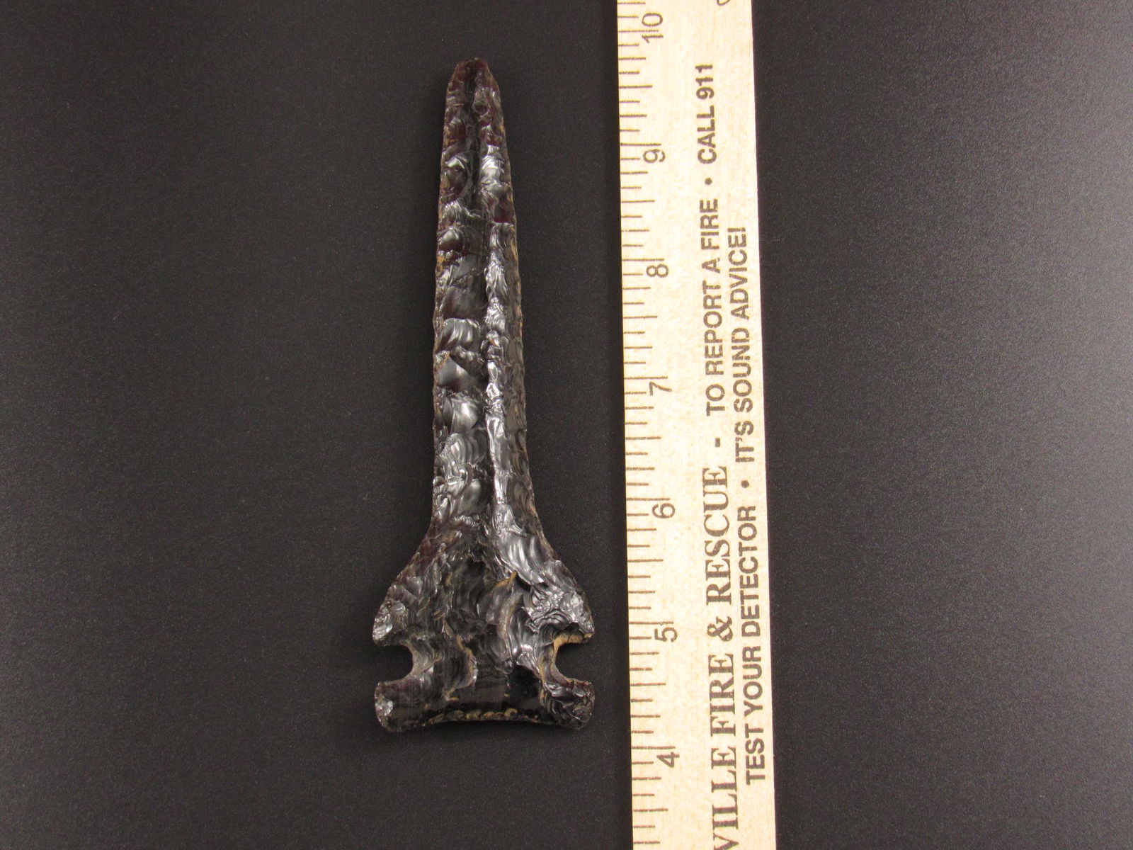 Beautiful And Very Large Indian Side Notched Obsidian Drill Arrowhead (1 of 2)