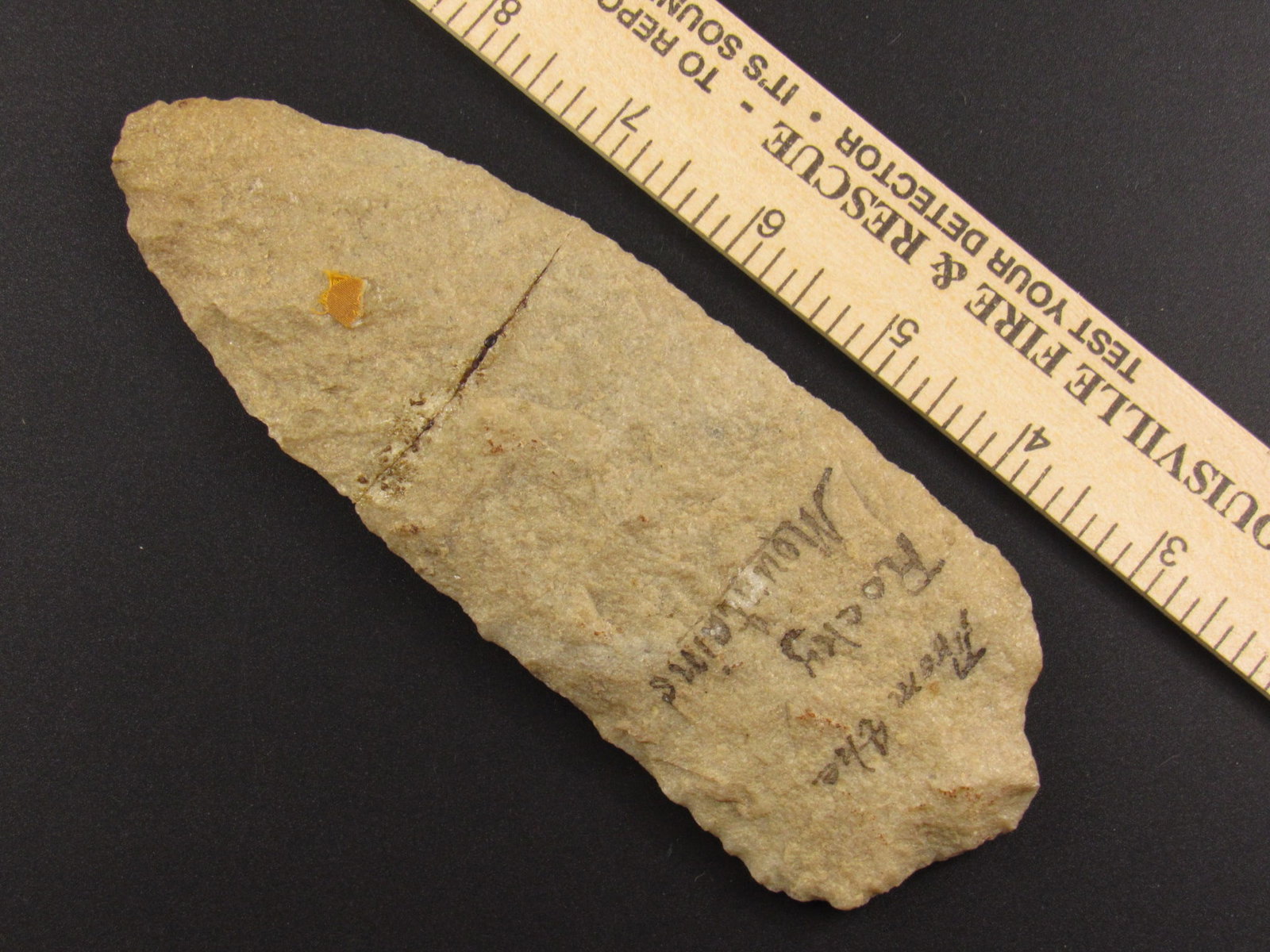 Very Large Native American Indian Stone Knife: Very Large Native American stone knife blade from an old estate in Richmond, Virginia. Appears to have been broken and glued. Writing on one side states "From the Rocky Mountains"