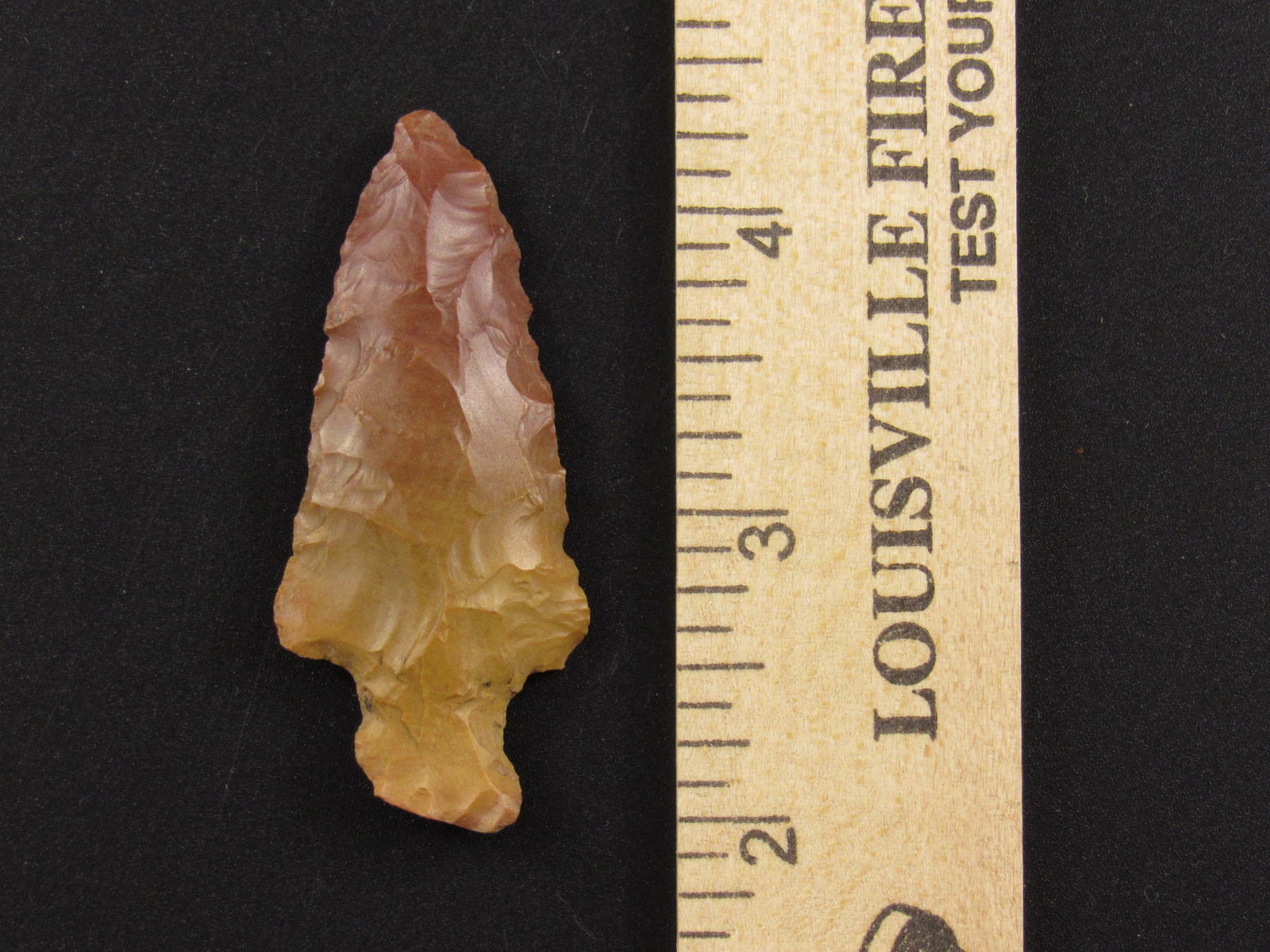 Colorful Prehistoric Native American Stemmed Flint Arrowhead: Very colorful Indian stemmed flint arrowhead. Ex B. Bowles collection.