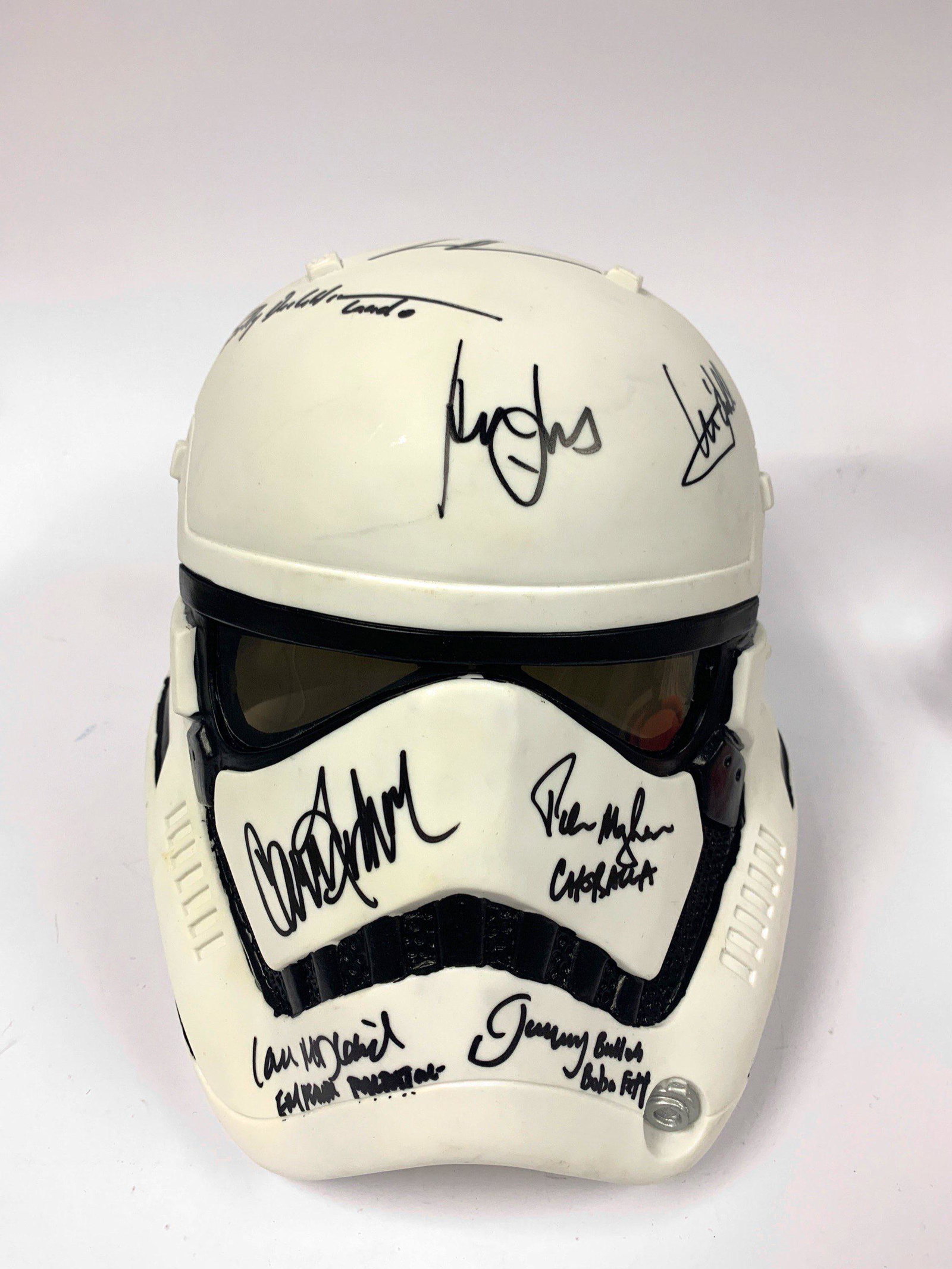 Autograph Signed Stormtrooper Helmet: Category: Autograph CollectiblesAutographed by: Harrison Ford, Mark Hamill, Carrie Fisher, Peter Mayhew, Ian McDiarmid, Jeremy Bulloch, George Lucas, Billy Dee Williams, Tim Rose, Mark Dodson, Dave Pr